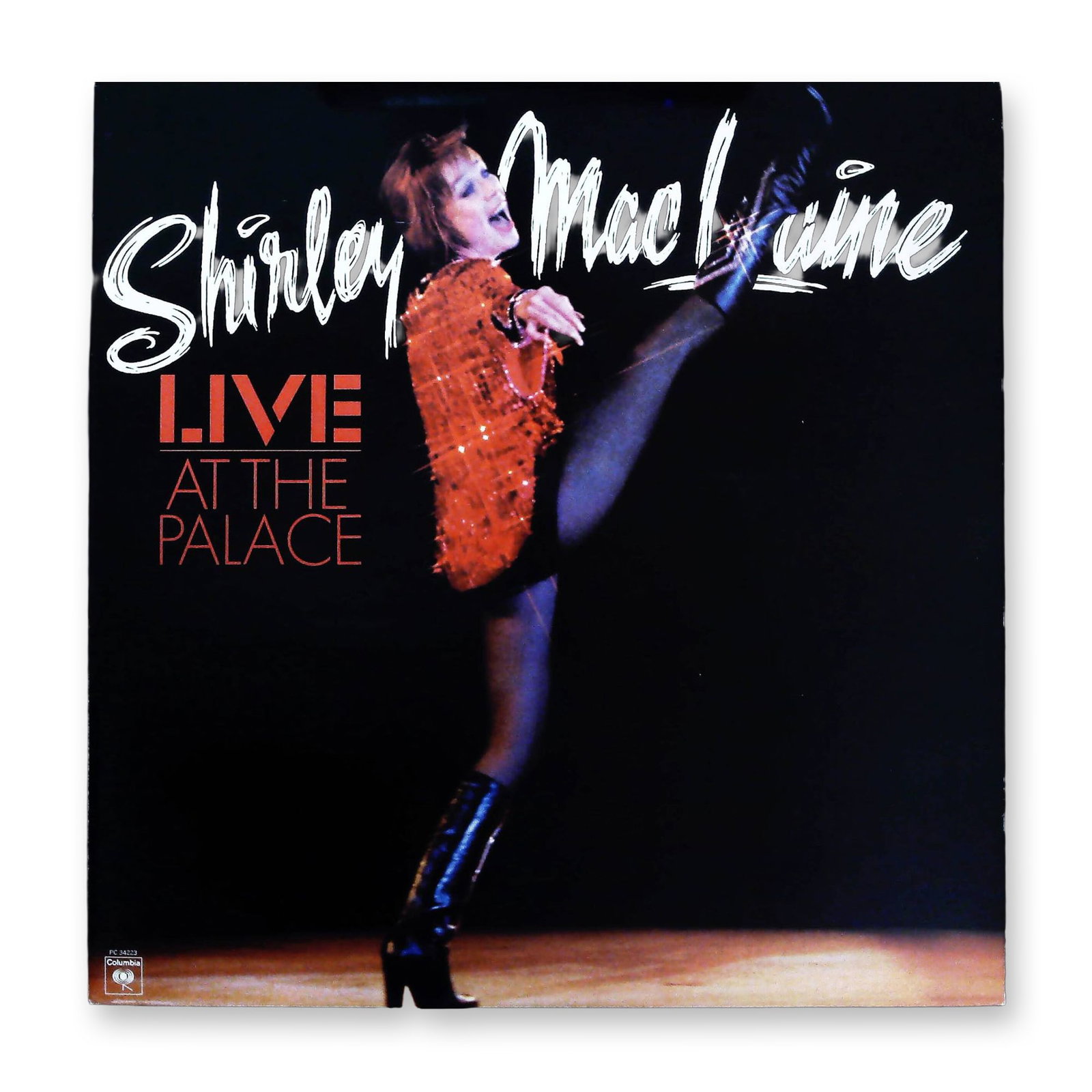 Shirley MacLaine Live At The Palace Columbia Vinyl LP Record: This is the original 1976 Columbia Records vinyl LP album, Shirley MacLaine Live At The Palace. The album features MacLaine's performance recorded in London in February 1976. The front sleeve displays