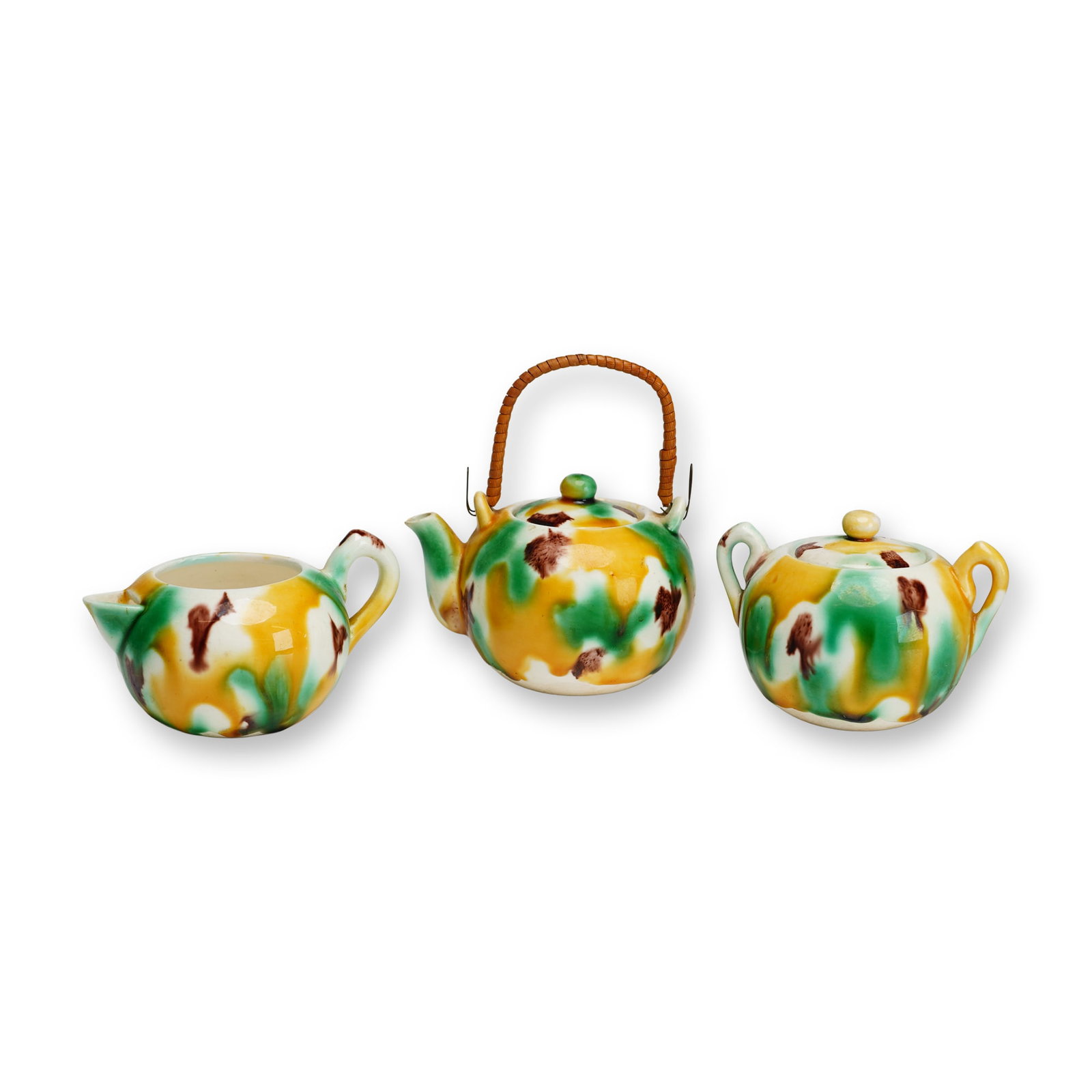 3pc Mini Tea Set in the Style of Takeshi Yasuda: A three-piece ceramic tea service of small proportions, likely dating to the mid-20th century. The collection includes a teapot, a lidded sugar bowl, and a creamer, all characterized by rounded, bulbo
