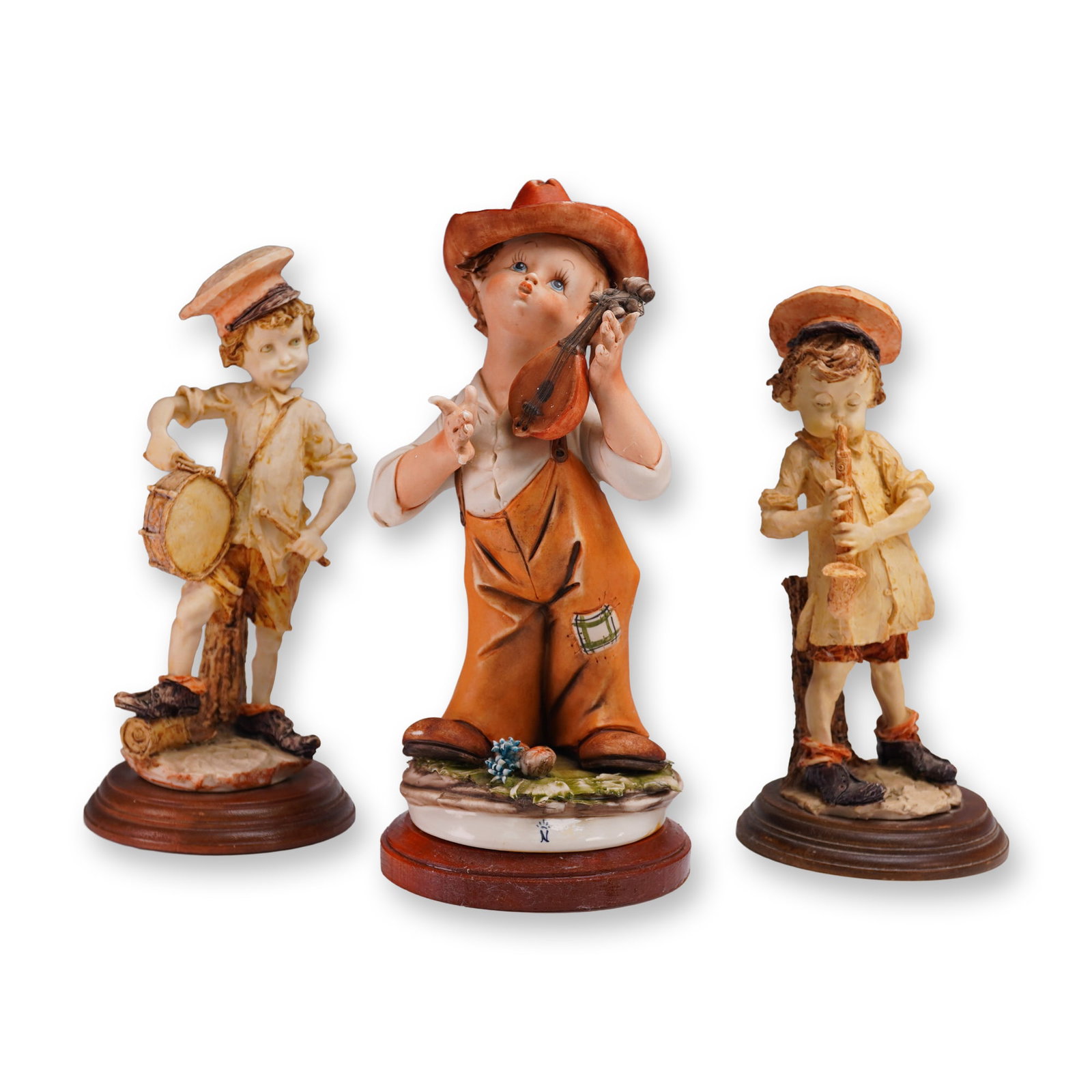 3pc Italian Figurine Lot Children Playing Instruments: Charming 3-piece set of vintage-style Italian figurines depicting children playing musical instruments. Each figure is individually sculpted and painted with expressive features and nostalgic detail, 