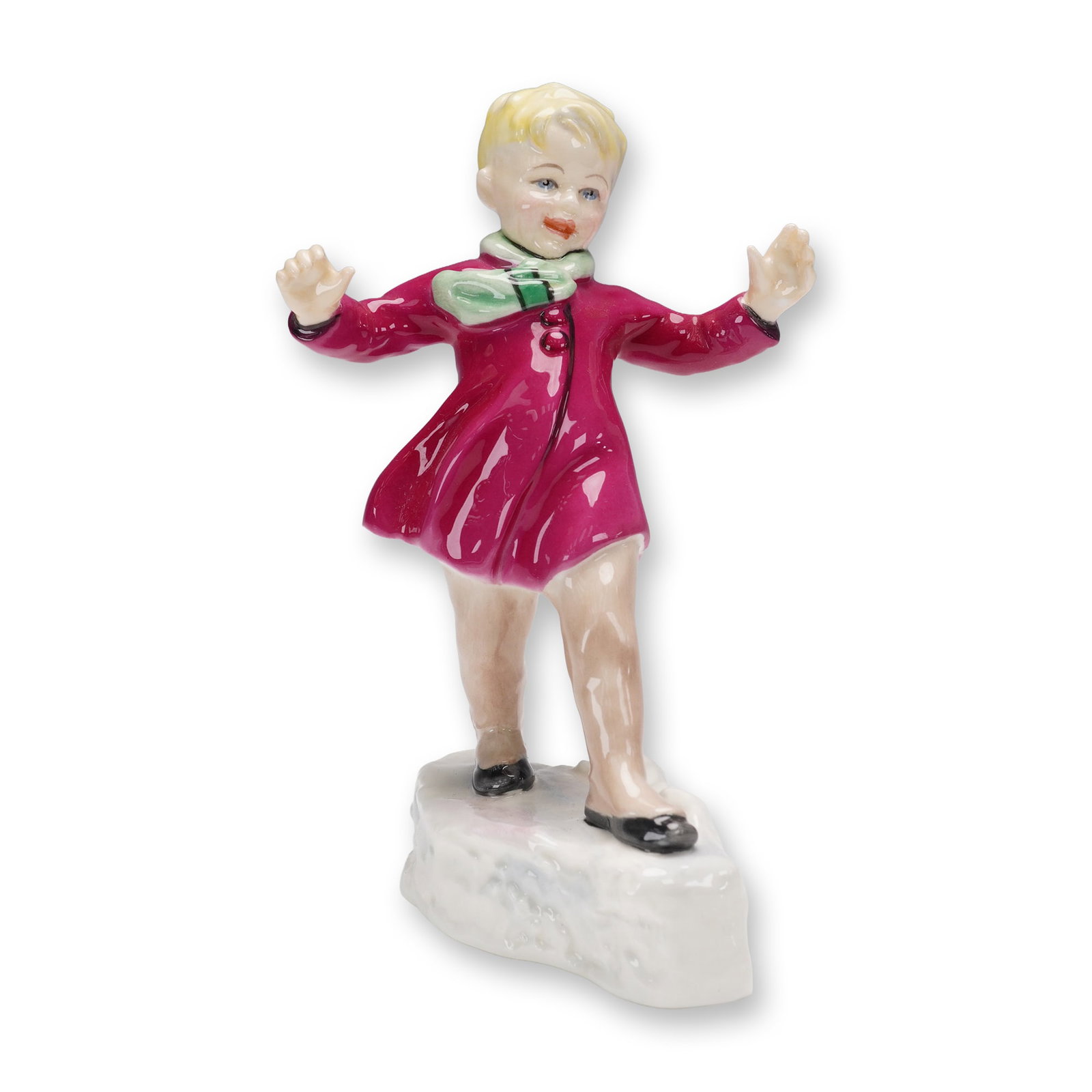 Royal Worcester Figurine, January 3452: Royal Worcester bone china figurine titled January, model 3452, modeled by F. G. Doughty. The piece depicts a young child in a bright red coat with green scarf, balancing playfully on a snowy base. Fi