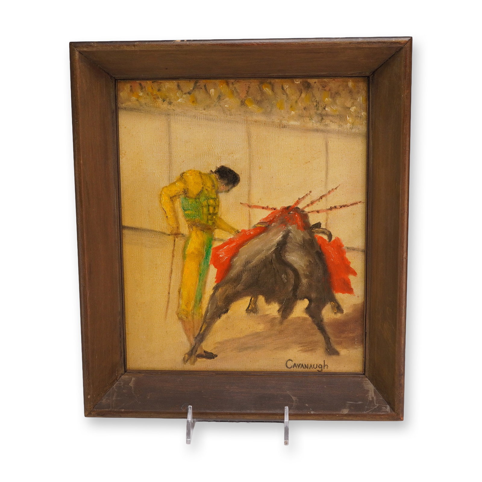 Cavanaugh, Spanish Bullfighting Scene Oil on Canvas: This oil on canvas painting by the artist Cavanaugh depicts a Spanish bullfighting scene. The composition features a matador in a vibrant yellow and green suit of lights engaged with a bull adorned wi