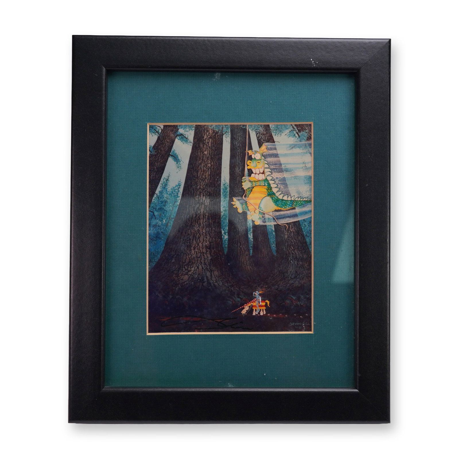 Framed Steve Gill Signed Fantasy Dragon Print 1990: Colorful fantasy art print by Steve Gill dated 1990, featuring a playful dragon swinging through a forest above a waiting knight. Artist signature appears in the lower left and printed name and date i