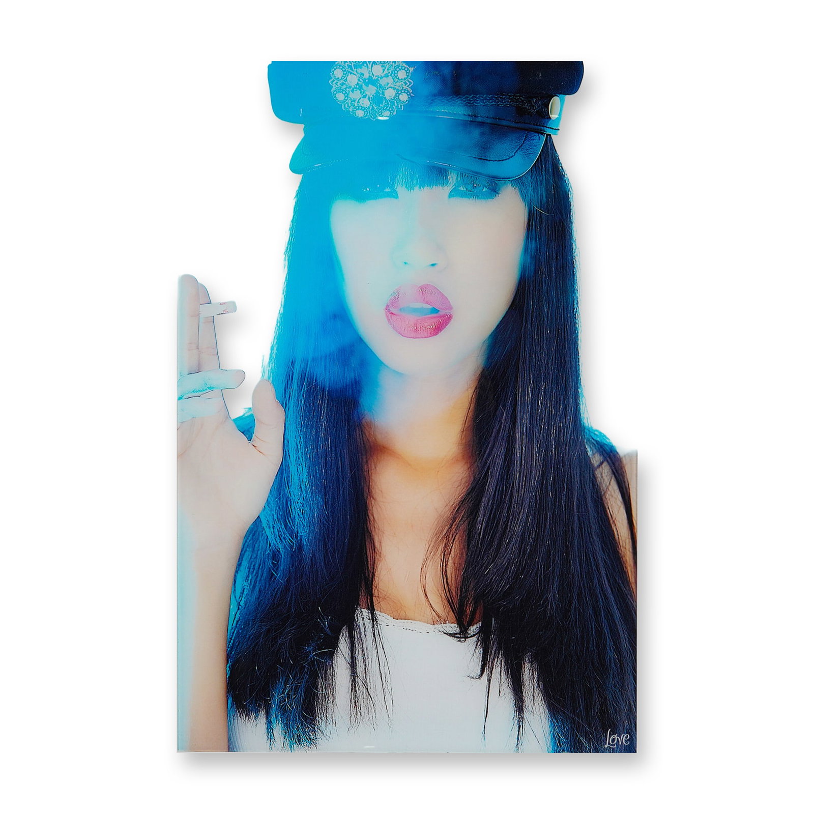 A Contemporary Photographic Print of a Woman in a Peaked Cap: This contemporary photographic print is produced on a rigid substrate, likely acrylic or metal. The composition depicts a stylized portrait of a woman with long dark hair wearing a black peaked cap wi