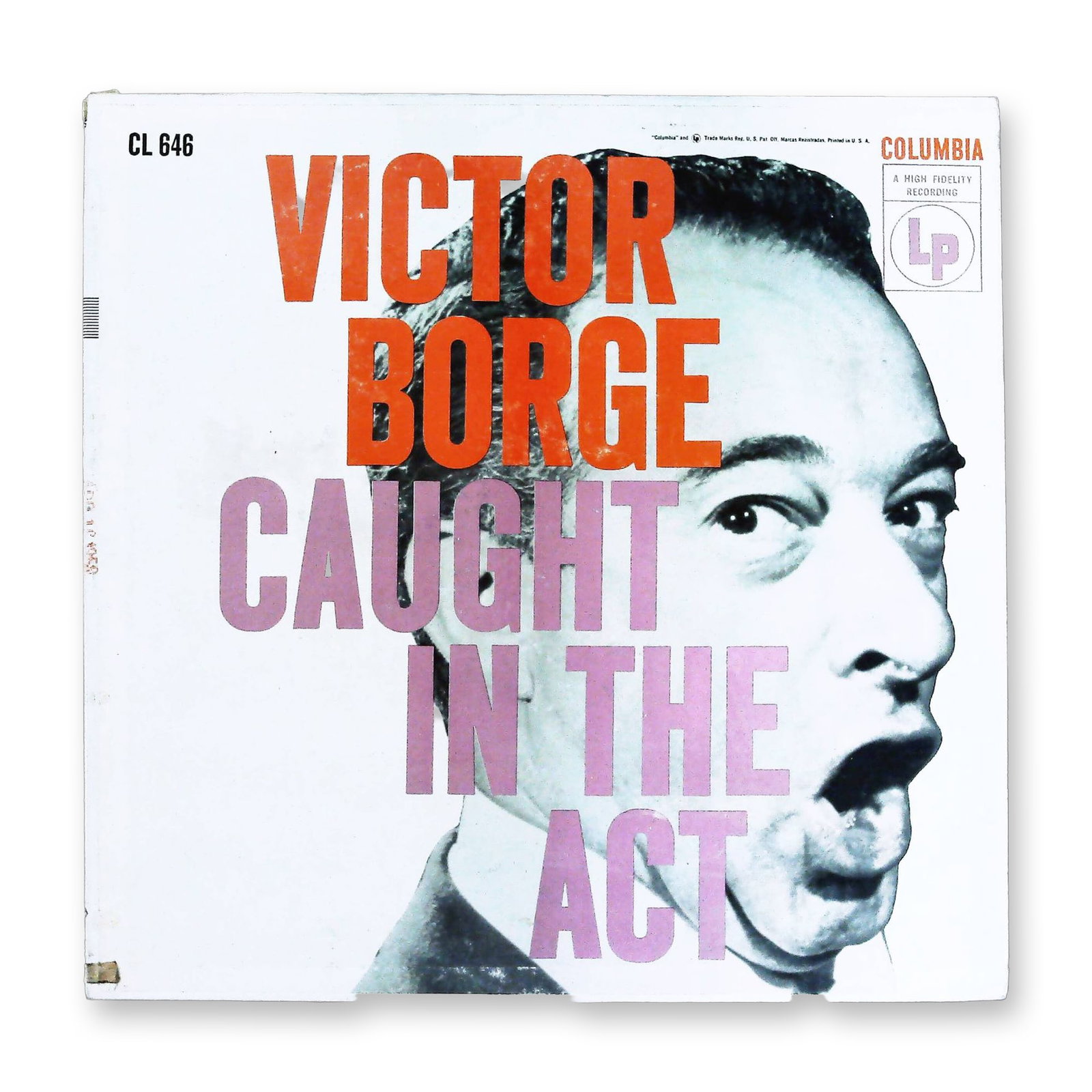 Victor Borge Caught in the Act Columbia Six Eye Vinyl LP: This is a single 12-inch vinyl LP record in its original album cover, featuring the comedian and pianist Victor Borge, titled Caught In The Act. The album was released on the Columbia label under cata