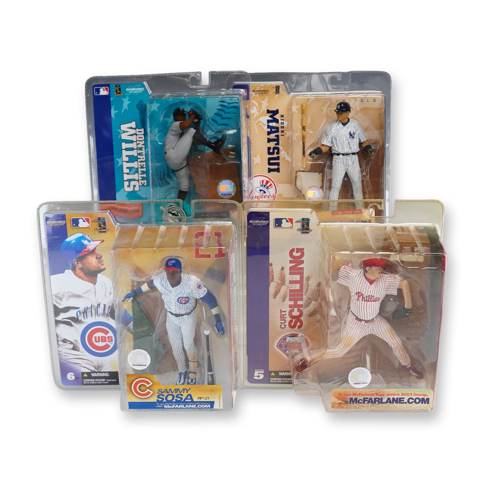 4pc McFarlane Toys MLB Sportspicks Action Figures Featuring Sammy Sosa, Dontrelle Willis, Hideki: A collection of four professional baseball action figures from the McFarlane Toys MLB Sportspicks series, spanning Series 5 through Series 9. Each figurine is presented in its original, unopened plast