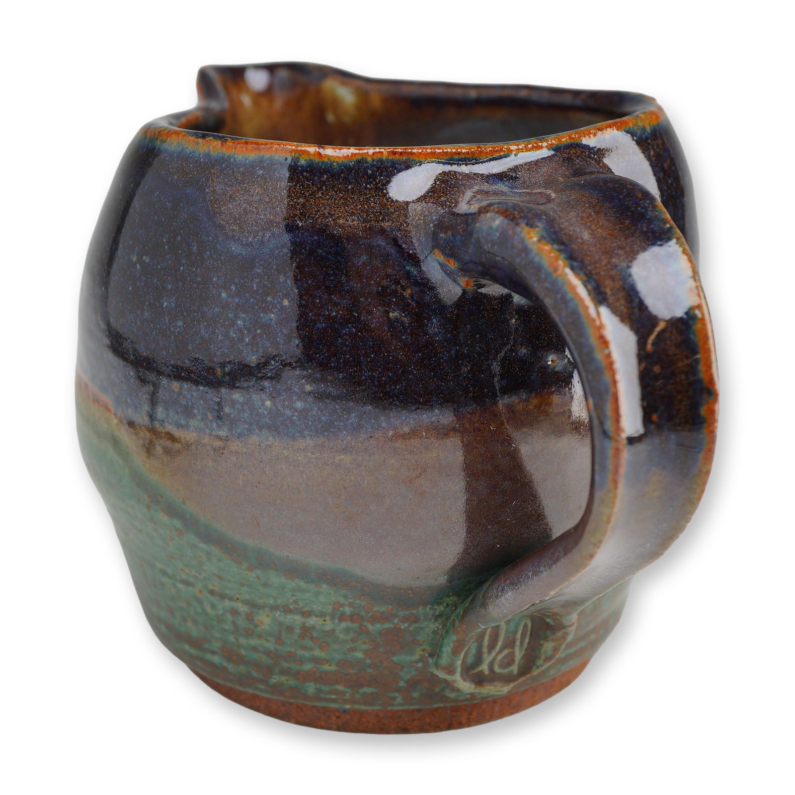 Linda DeBoer Studio Art Pottery Jug: Handcrafted studio ceramic jug by Tucson, Arizona artist Linda DeBoer. This organic-form vessel features a softly rounded body with a free-flowing, asymmetrical mouth and applied handle. The surface i