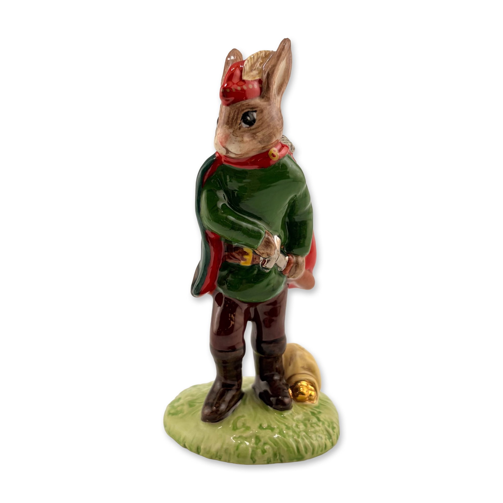 Royal Doulton Prototype Bunnykins Figurine, Robin Hood: Wearing his signature bycocket hat, vividly decorated in red with yellow stitching and a beige cock feather, this exceptionally rare Robin Hood Bunnykins prototype depicts the legendary rabbit hero in