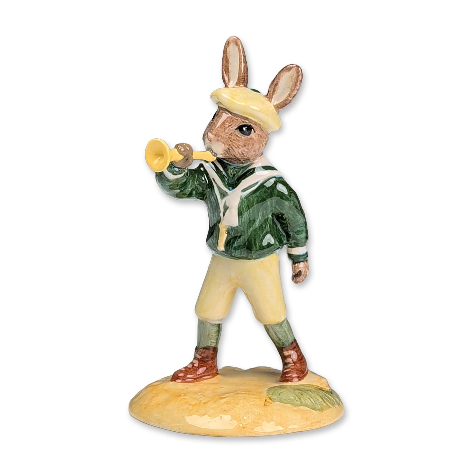 Royal Doulton Prototype Colorway Bunnykins Figurine, Little Boy Blue DB239: Bunnykins series ceramic figurine in glazed porcelain. The figure depicts a rabbit dressed in a green jacket with white trim, yellow trousers, and brown boots, blowing into a yellow horn. The characte