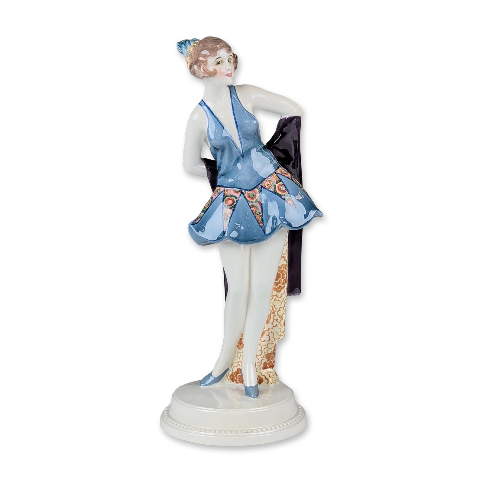 Goldscheider by Wilhelm Thomasch Art Deco Ceramic Dancer Figurine, 5314: Standing dancer figurine in polychrome glazed earthenware, designed by Wilhelm Thomasch. The figure depicts a female performer in a stylized pose leaning against a column decorated with a brown and cr