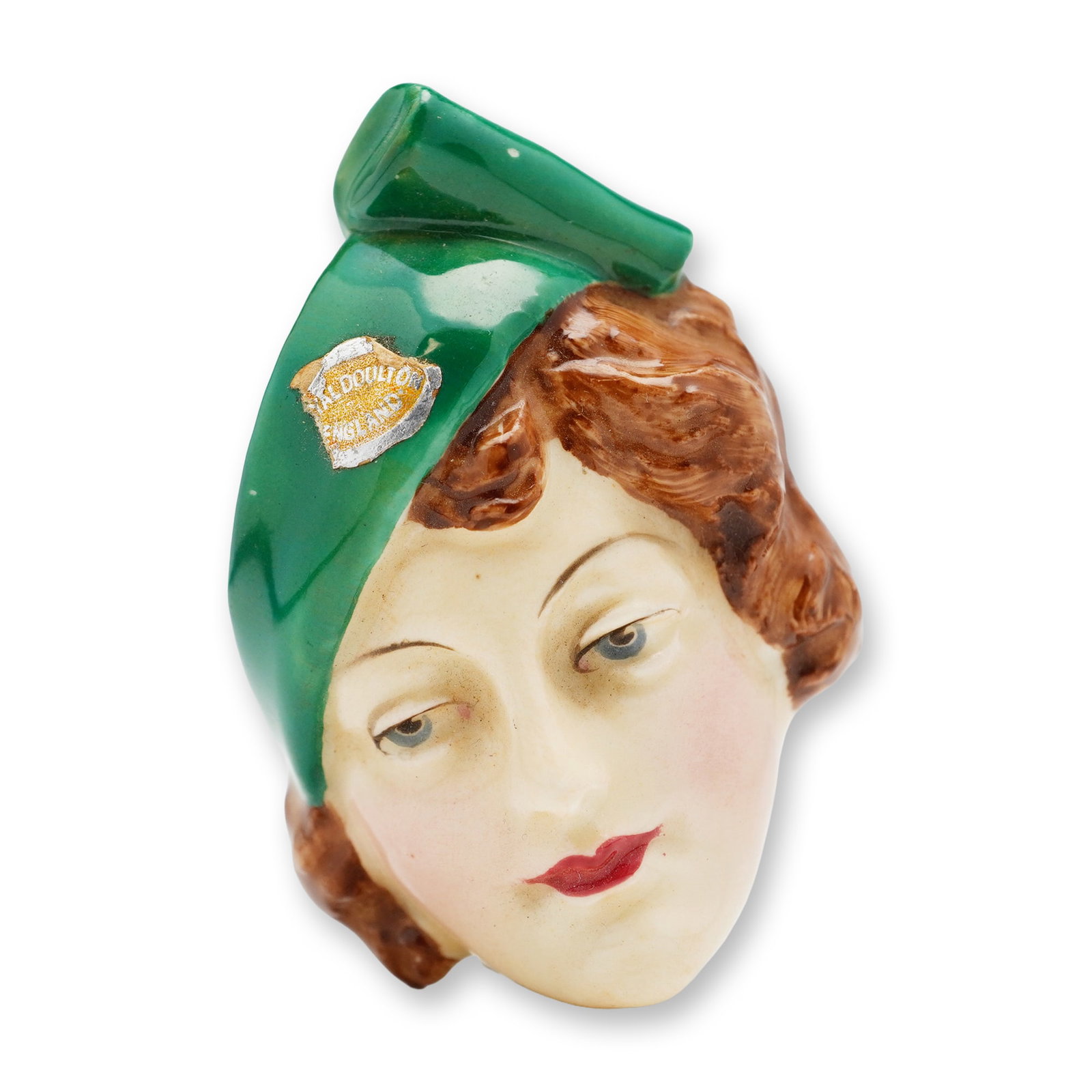Royal Doulton Porcelain Wall Masks, Lady in Stylish Hat HN1613: Hand painted, flesh color face, brown hair and green hat. Royal Doulton backstamp and sticker. Dimensions: 2"W x 2.75"H x 1"D Manufacturer or Brand: Royal Doulton Country of Origin: England Weight: 25