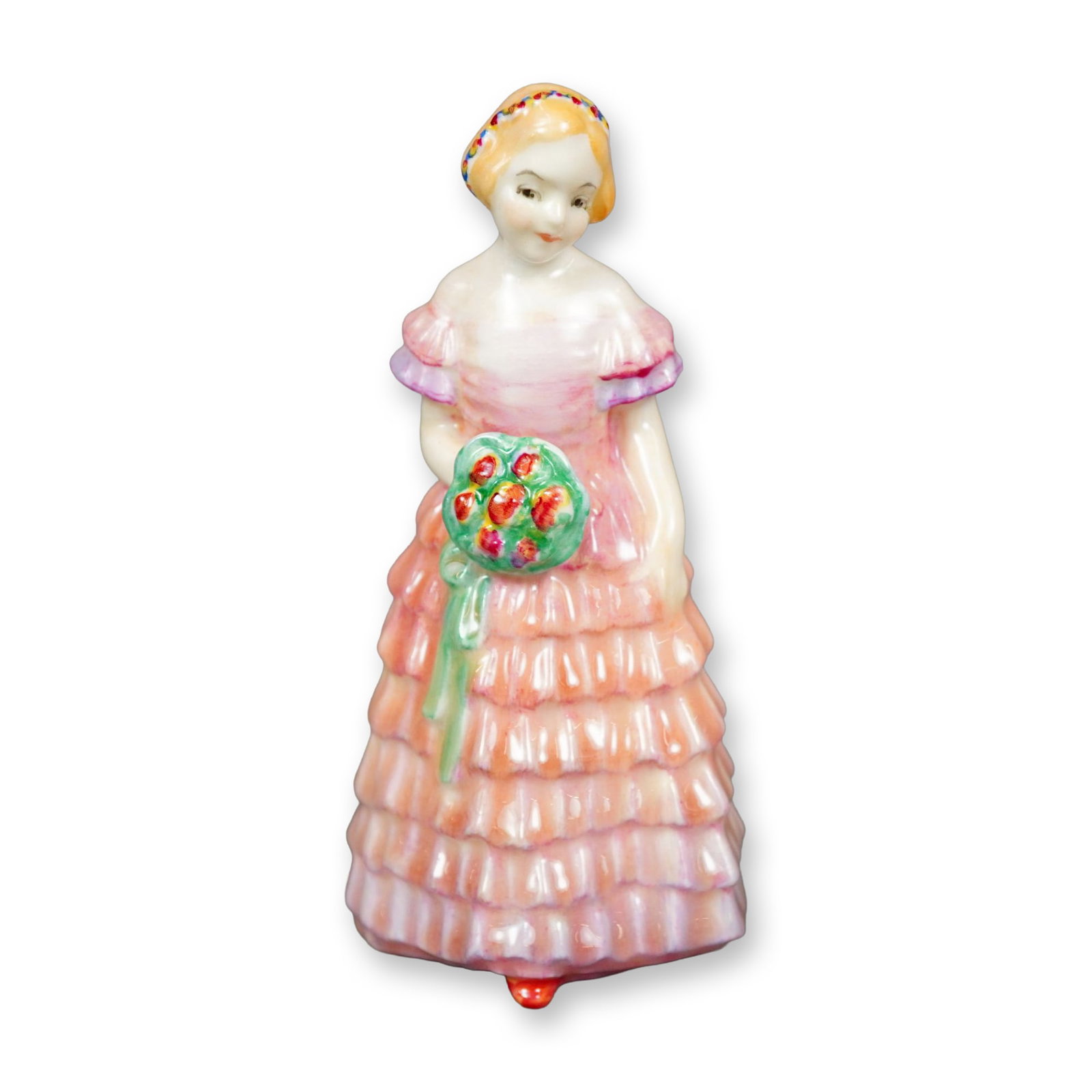 Royal Doulton Figurine, Bridesmaid M11: Hand painted figure of a young girl in a pink ruffled dress with purple highlights. She is holding a bouquet of flower. Royal Doulton backstamp. Dimensions: 2"L x 1.75"W x 3.75"H Manufacturer or Brand