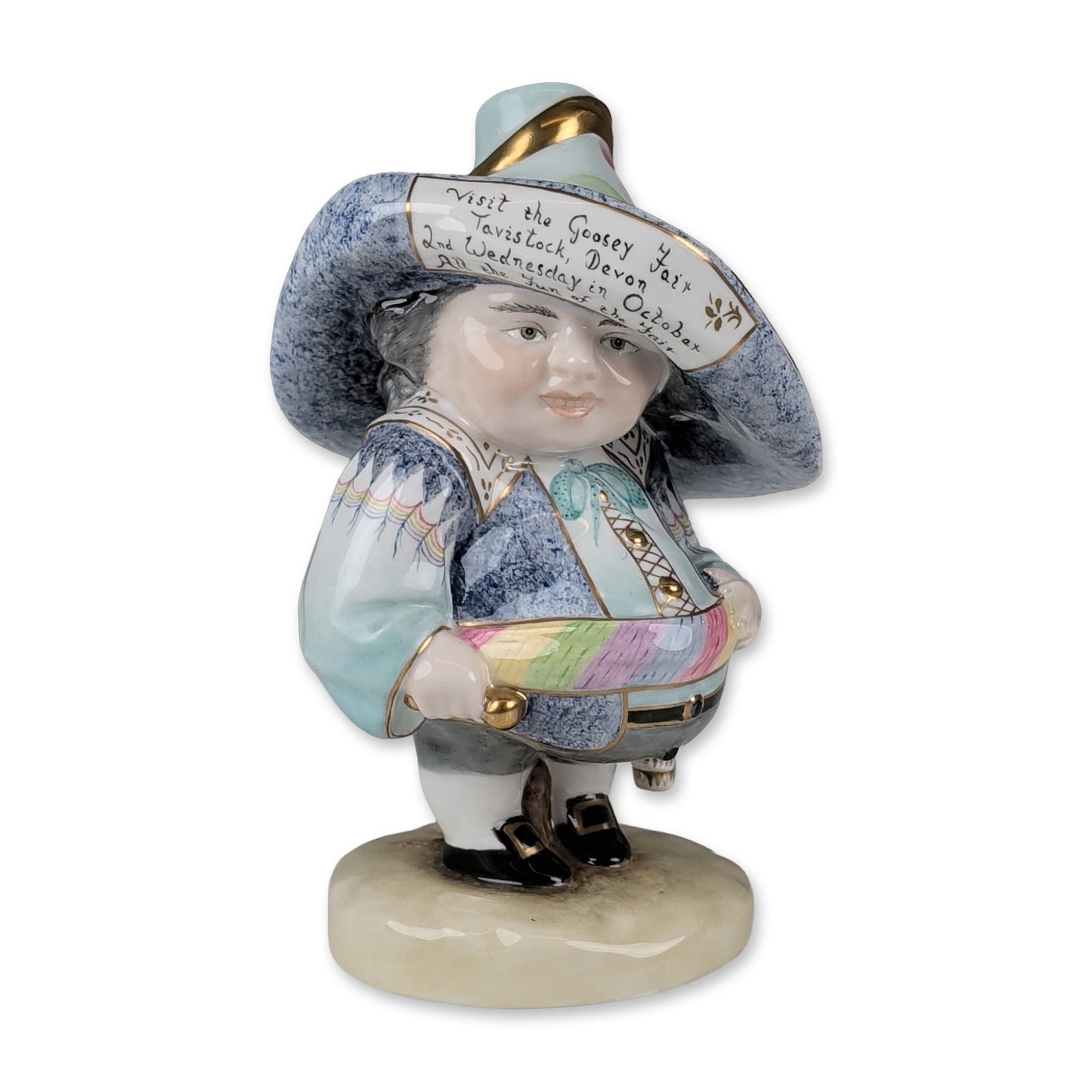 Royal Crown Derby by J. Griffiths Mansion House Dwarf Bone China Figurine, Goosey Fair: The figure is modeled in theatrical costume featuring a wide-brimmed hat with hand-painted inscription reading Visit the Goosey Fair Tavistock, Devon 2nd Wednesday in October All the fun of the fair. 