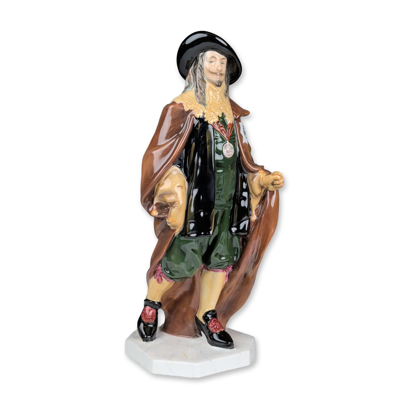 Royal Doulton Porcelain Prototype Sculpture, King Charles I: A polychrome glazed ceramic portrait figurine of King Charles I. The figure is depicted in 17th-century attire, including a wide-brimmed black hat, lace-edged collar, green doublet and breeches, and a
