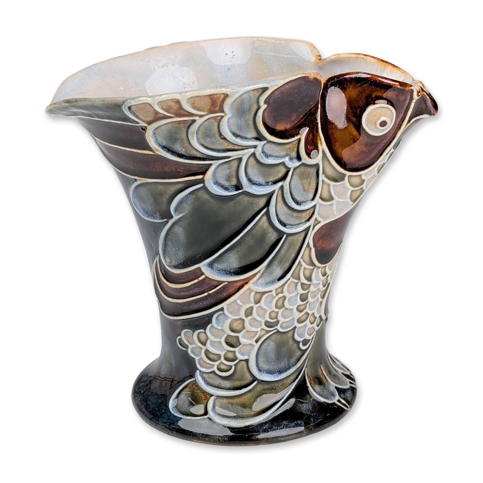 Doulton Lambeth by Mark Marshall Stoneware Art Nouveau Bird Motif Vase: Fashioned in the form of a stylized bird head with the beak pointed outward. The vessel features tube-lined decoration depicting a carp or koi with large scales and flowing fins wrapping around the bo