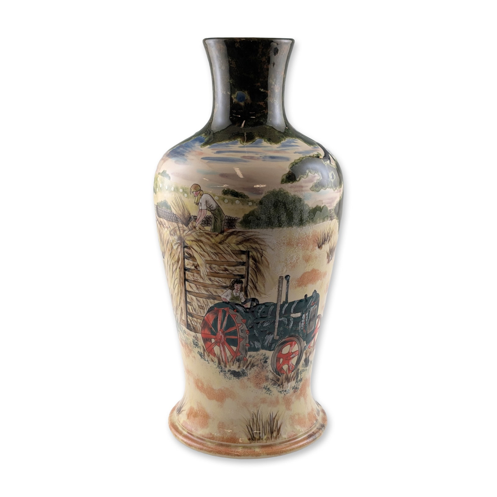 Cobridge Stoneware Trial Harvest Vase: This trial piece features a hand-painted and tube-lined rural harvest scene, depicting a vintage grey tractor with red spoked wheels, a young operator, and a woman stacking grain sheaves onto a wagon.