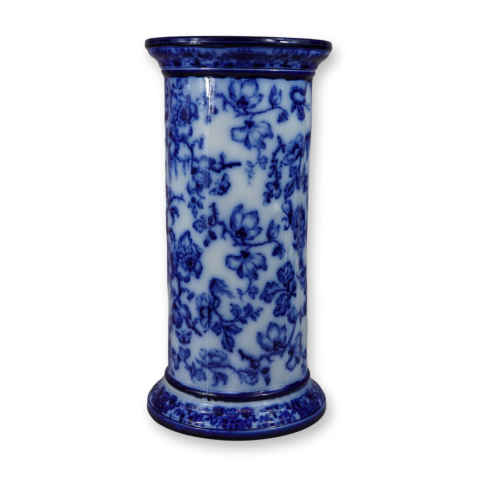 Wedgwood Swallow Blue and White Earthenware Garden Stand: An earthenware cylindrical pedestal or garden stand featuring a molded, flared rim and base by Wedgwood. The exterior is decorated with an all-over underglaze transfer-printed floral and botanical mot