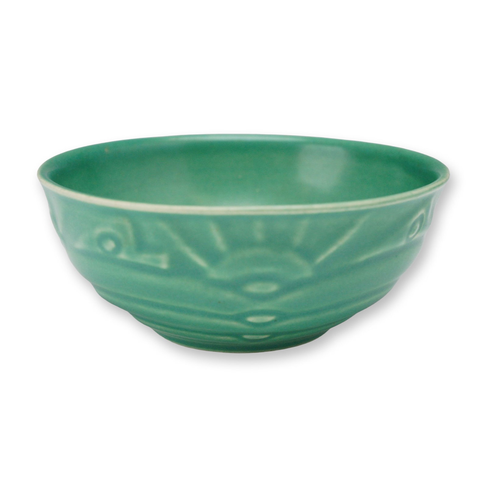 Wedgwood Art Deco Matte Glaze Finger Bowl, ca. 1932: This Art Deco earthenware bowl by Wedgwood, dating to circa 1932, features a molded exterior sunburst pattern with raised circular accents. The piece is finished in a uniform turquoise green matte gla