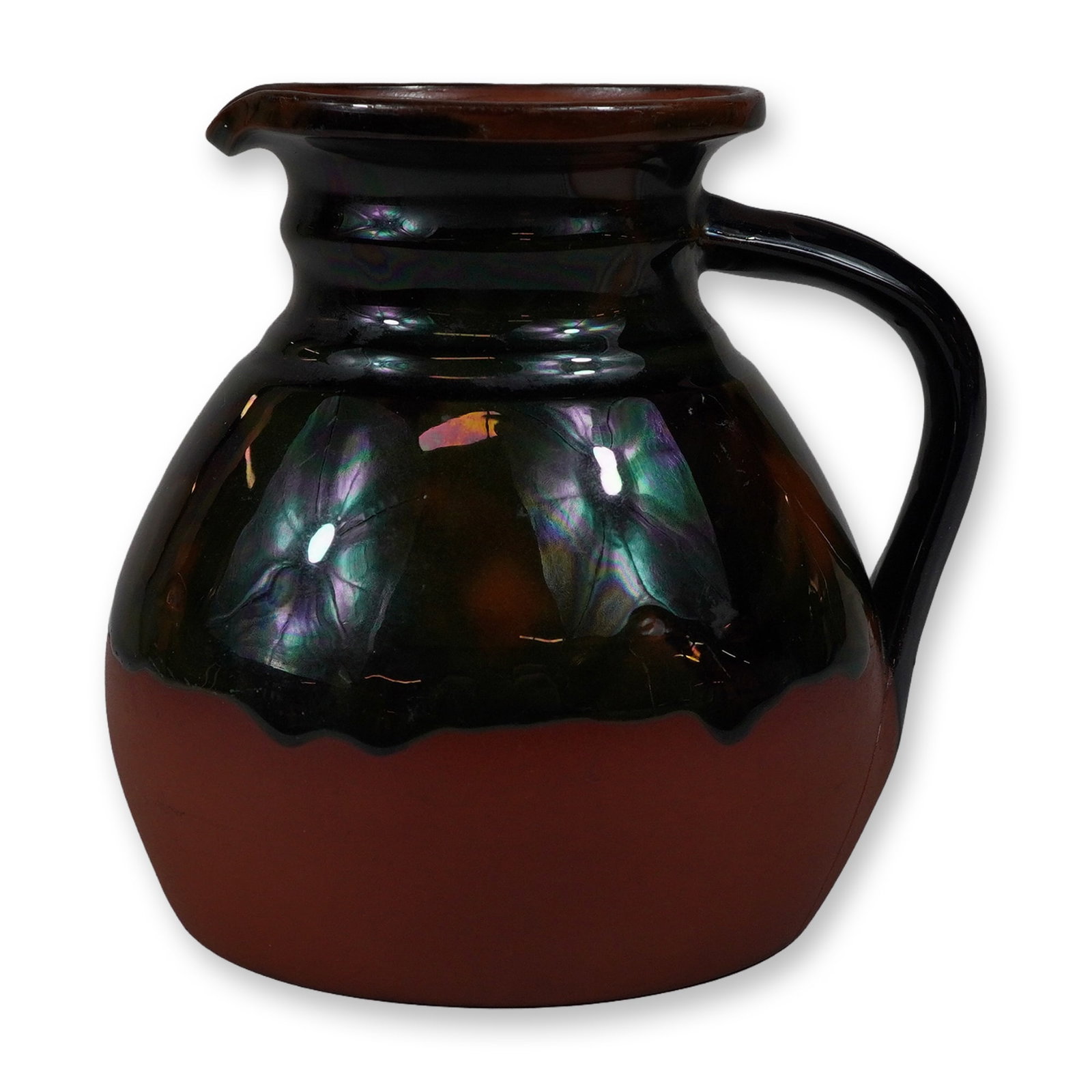 Wedgwood Rosso Antico Iridescent Drip Glaze Pitcher: A late 19th-century Wedgwood stoneware pitcher composed of the firm's Rosso Antico terracotta body. The vessel is designed with a globular form, a wide neck featuring two raised rings, a flared rim wi