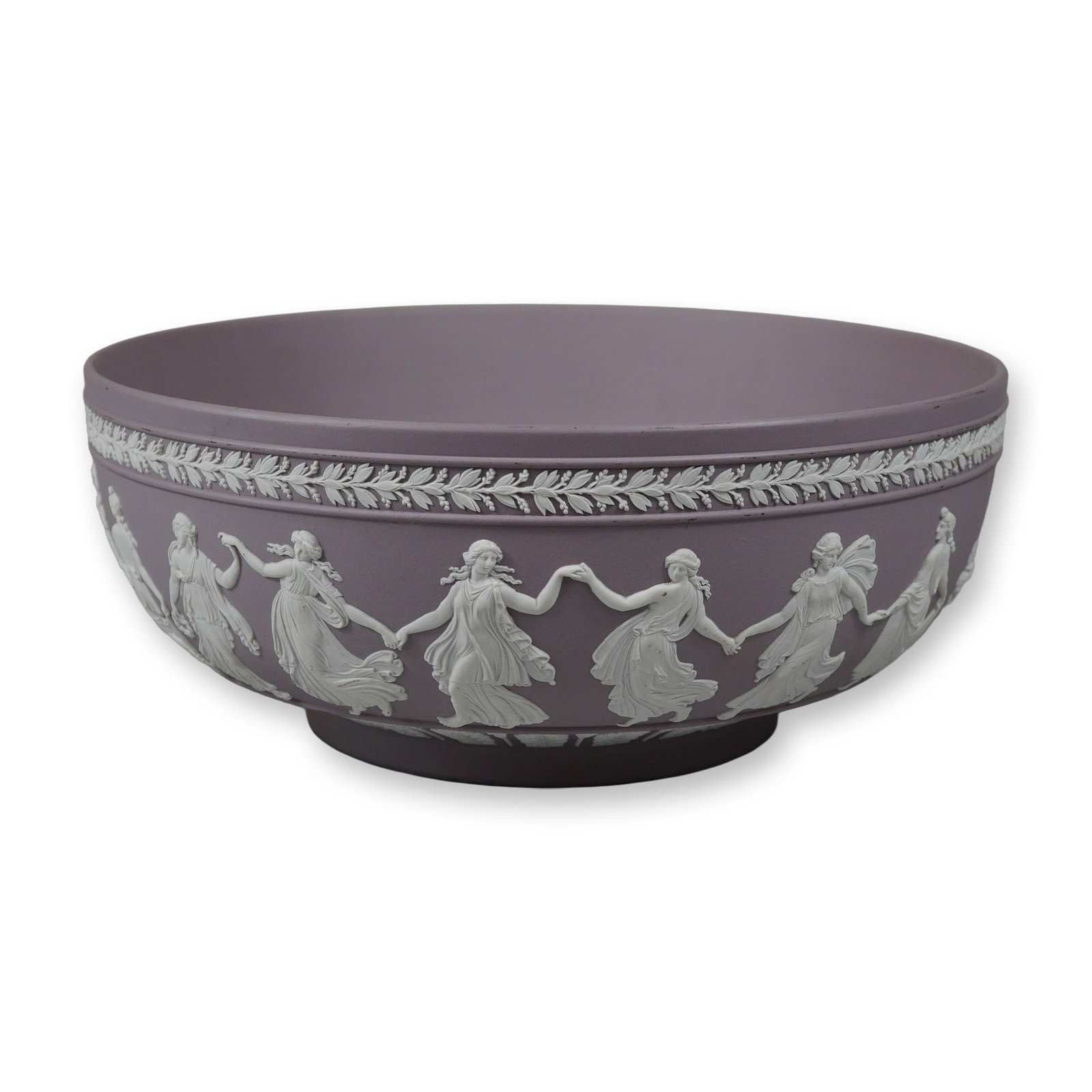 Wedgwood Lilac Jasperware Dancing Hours Large Bowl: This is a large Wedgwood jasperware bowl in the lilac colorway, featuring the classic Dancing Hours motif. The piece is constructed from unglazed stoneware with sprigged bas-relief decoration in white