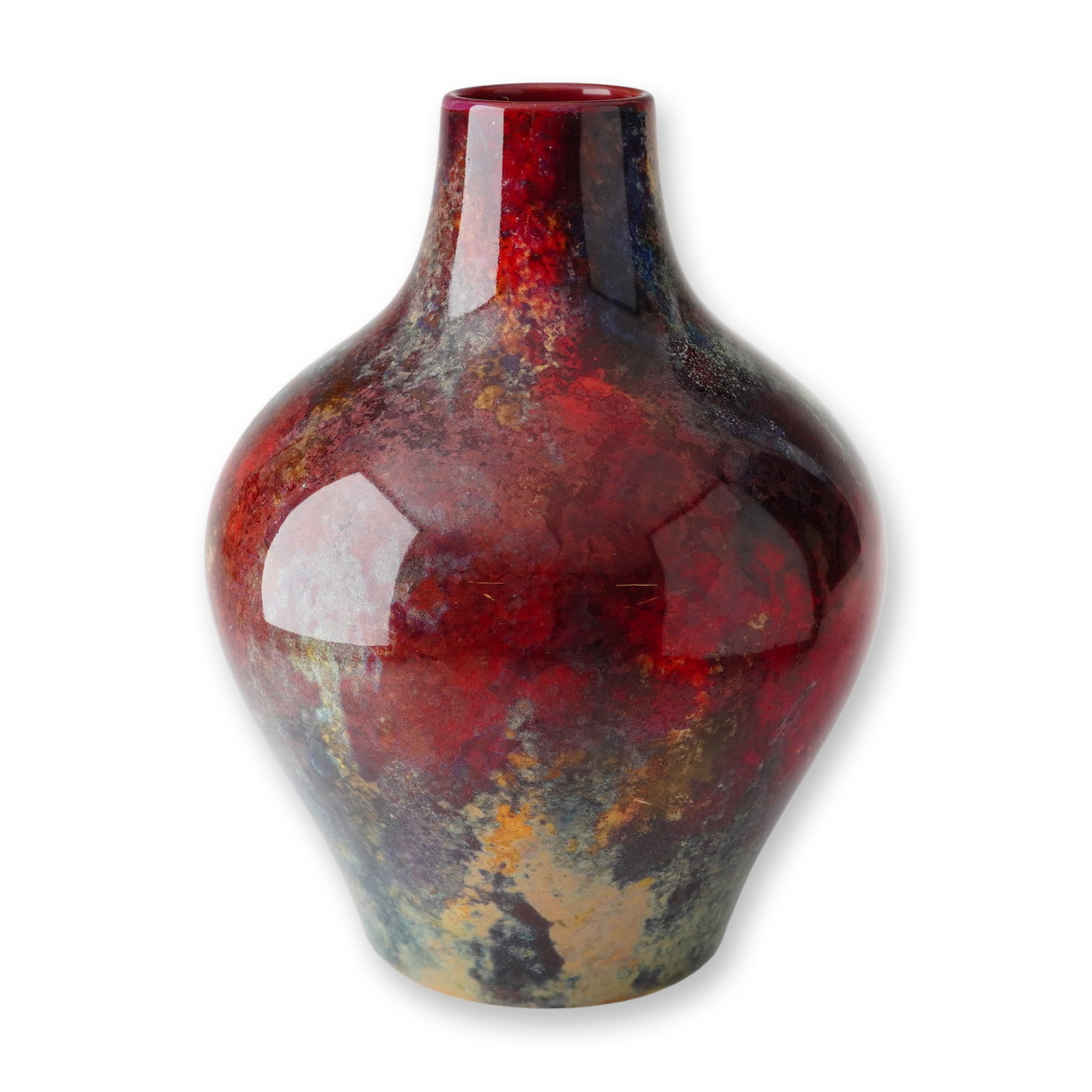 Royal Doulton Flambe Vase: A small, red-flambe glazed vase with a broad, swollen midsection and a slightly narrowed neck and base. The surface displays a mottled finish in blue, yellow, and white tones. Marked with the Royal Do