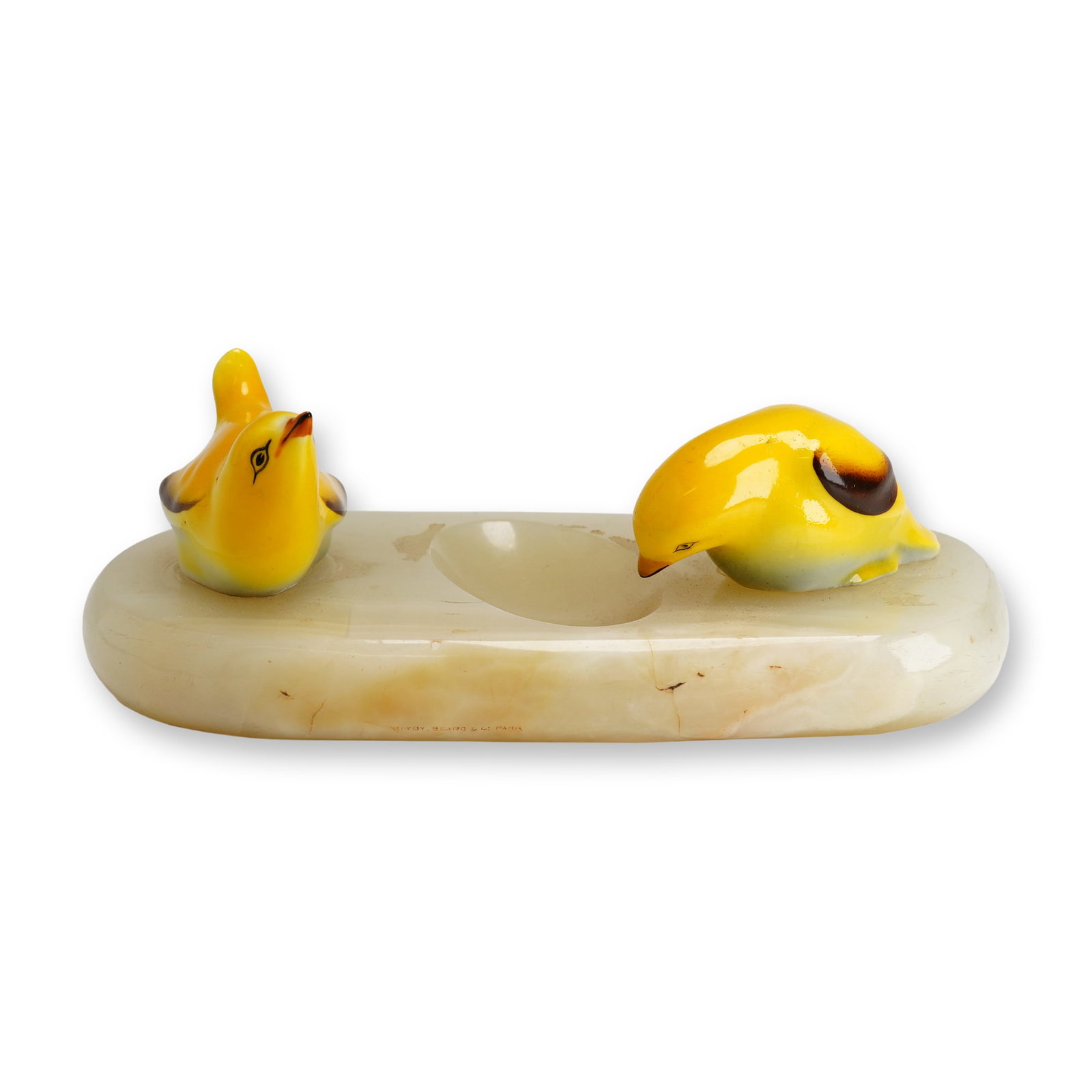 Royal Doulton Fledgling Birds on Onyx Tray: A light-toned oval onyx tray featuring a shallow carved oval recess at its center. The piece is decorated with two Royal Doulton Royal Doulton Fledgling birds, models HN137B and HN145A, rendered in ye