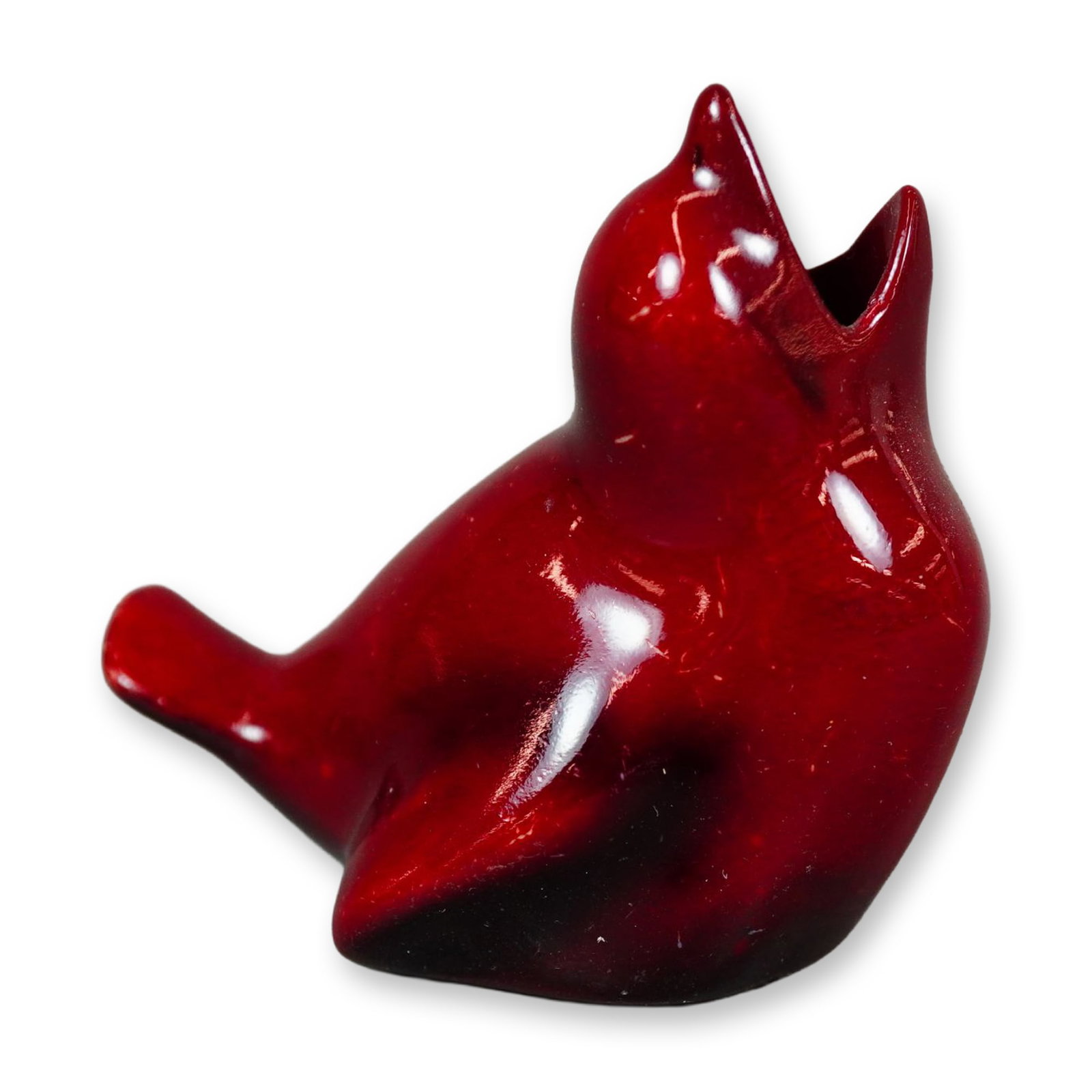 Royal Doulton Porcelain Flambe Bird Figurine, Fledgling HN137A: Hand-painted figurine of a baby bird in flambe red glaze. The bird is depicted seated with its beak open wide. Royal Doulton backstamp to the underside. Dimensions: 2.25"L x 1.5"W x 2"H Manufacturer o