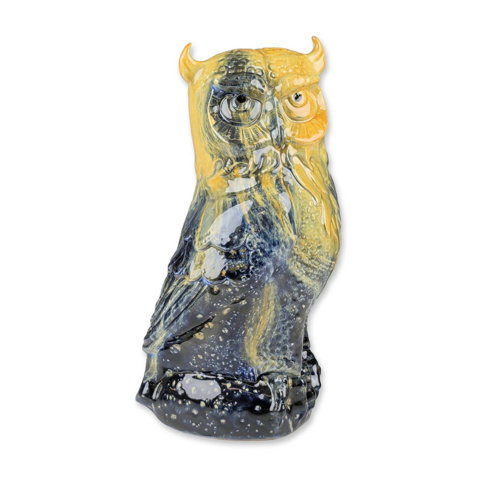 Royal Doulton Flambe Veined Colorway Blue and Yellow Porcelain Great Horned Owl Figurine: Seated great horned owl figurine in glazed ceramic, featuring a variegated Flambe glaze transitioning from amber-yellow at the head to deep cobalt blue at the base. The piece is modeled with tufted ea