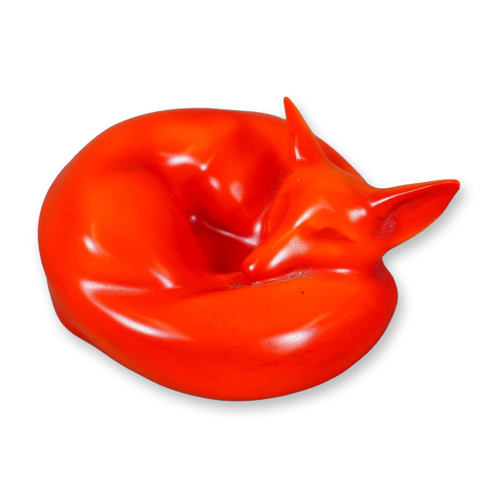Rare Royal Doulton Red Experimental Glaze Figurine, Fox Curled HN147D: A porcelain figure of a resting fox in a red satin-like finish. The underside is white glossy that bears the Royal Doulton stamp. Dimensions: 4.5"L x 4"W x 1.75"H Date or Era: c. 1912 Manufacturer or 