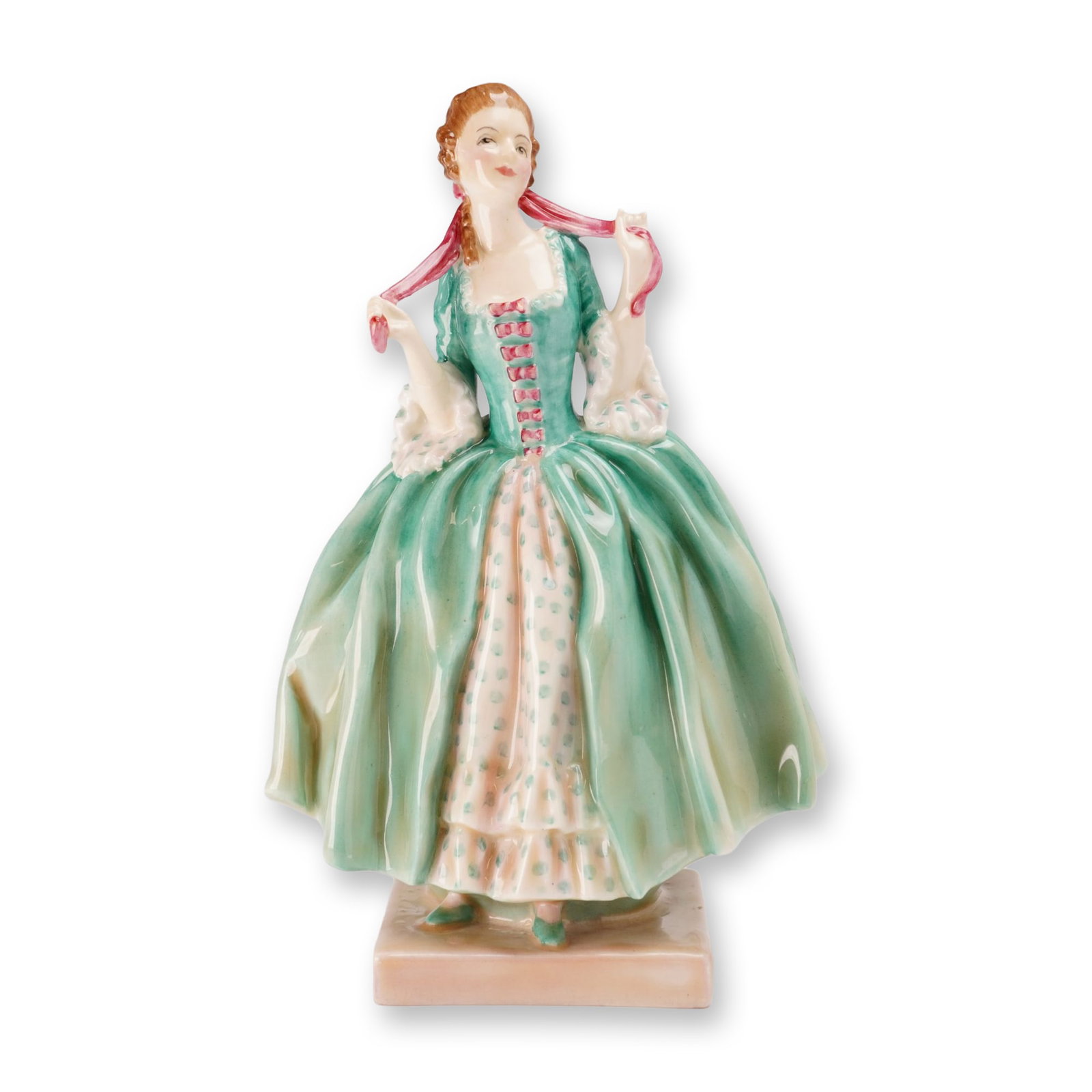 Royal Doulton Porcelain Figurine, Virginia HN1694: The figure depicts a woman in 18th-century style dress featuring a green mantua-style overskirt over a cream-colored polka-dot underskirt, with pink ribbon detailing. The underside of the base bears a