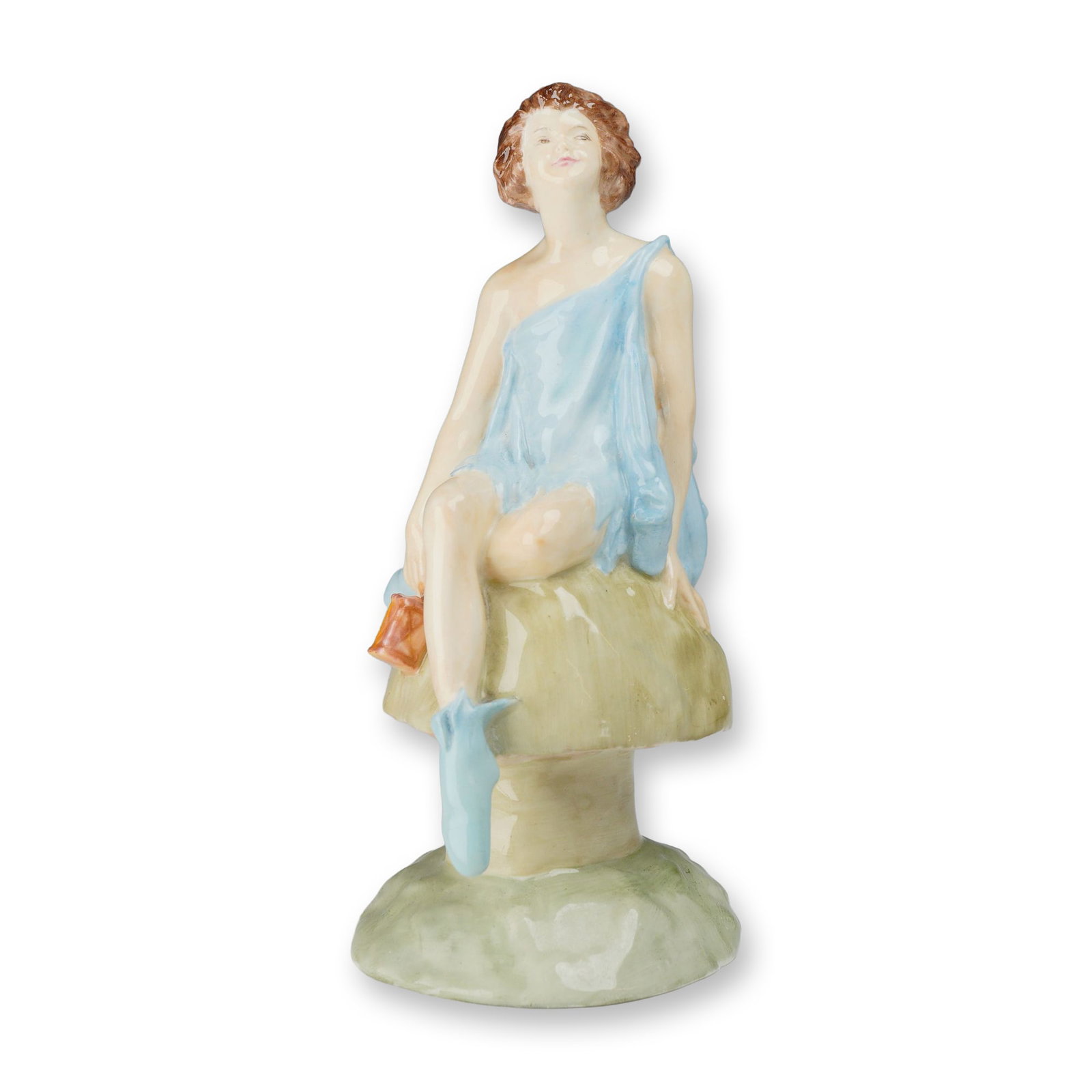 Wedgwood Porcelain Will o' Wisp Figurine by Kathleen Goodwin: A Wedgwood glazed porcelain figurine titled Will o' Wisp, designed by Kathleen Goodwin. This hand-painted figure depicts a nymph or young woman with an ethereal expression seated atop a large mushroom