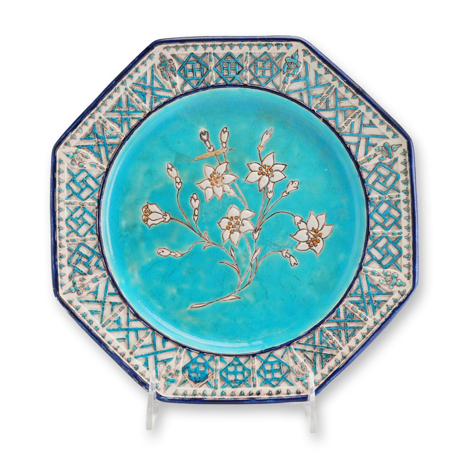 Wedgwood Aesthetic Movement Enameled Majolica Octagonal Plate: Wedgwood fine earthenware octagonal plate, c. 1877. The design features a central circular well finished in a turquoise-blue glaze and decorated with a hand-painted botanical motif of white floral spr