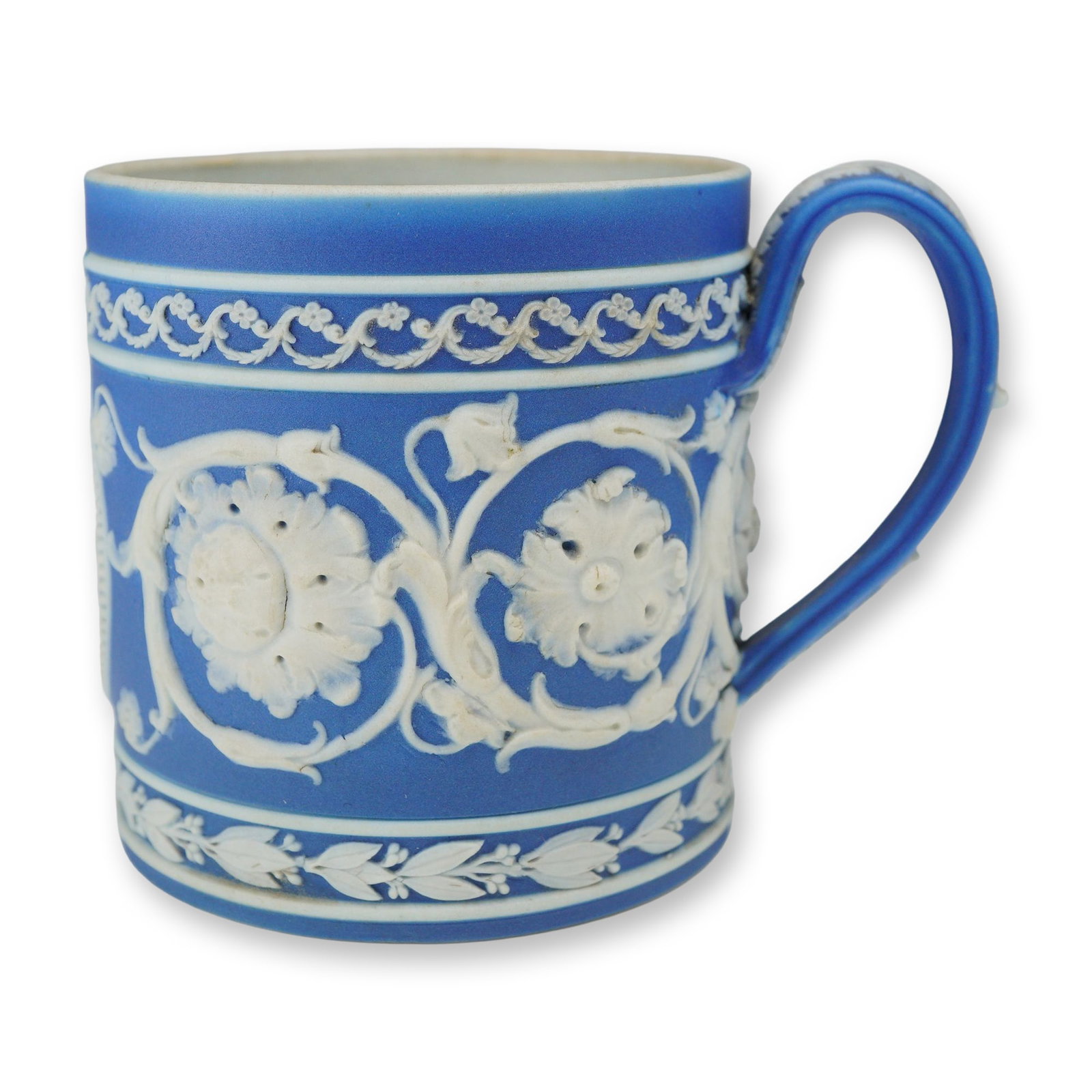 Wedgwood Blue Jasperware Zodiac Demitasse Coffee Cup, Sagittarius: The piece is crafted from blue-dip jasperware, featuring a cobalt blue surface over a white stoneware body, with the interior remaining white. The exterior is decorated with finely detailed applied wh