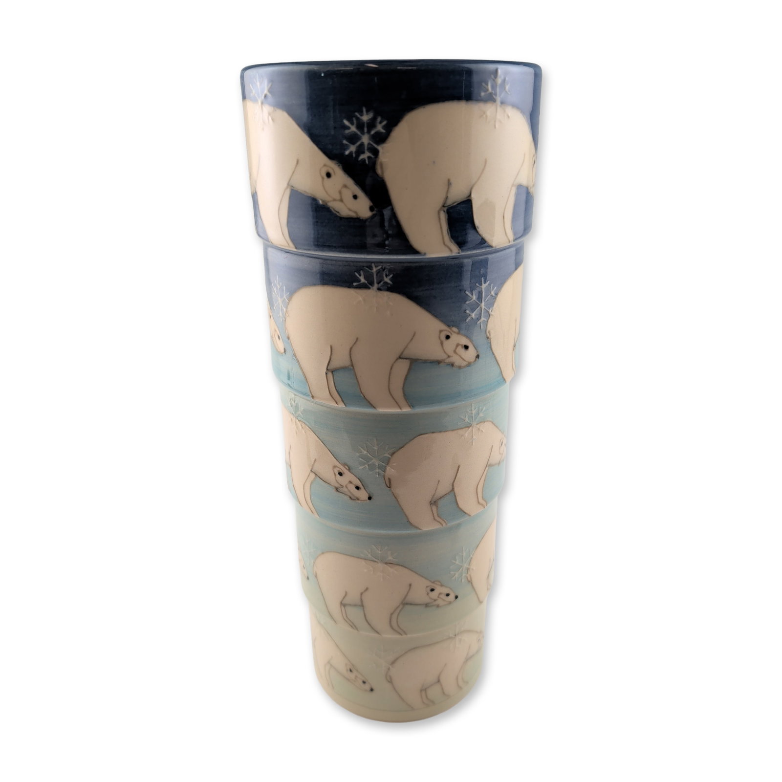 Dennis Chinaworks by Sally Tuffin Polar Bear Stepped Vase: Stepped cylindrical vase in earthenware. The vessel is decorated with stylized polar bears and snowflakes executed using tubelining and sgraffito techniques. The background decoration consists of a gr