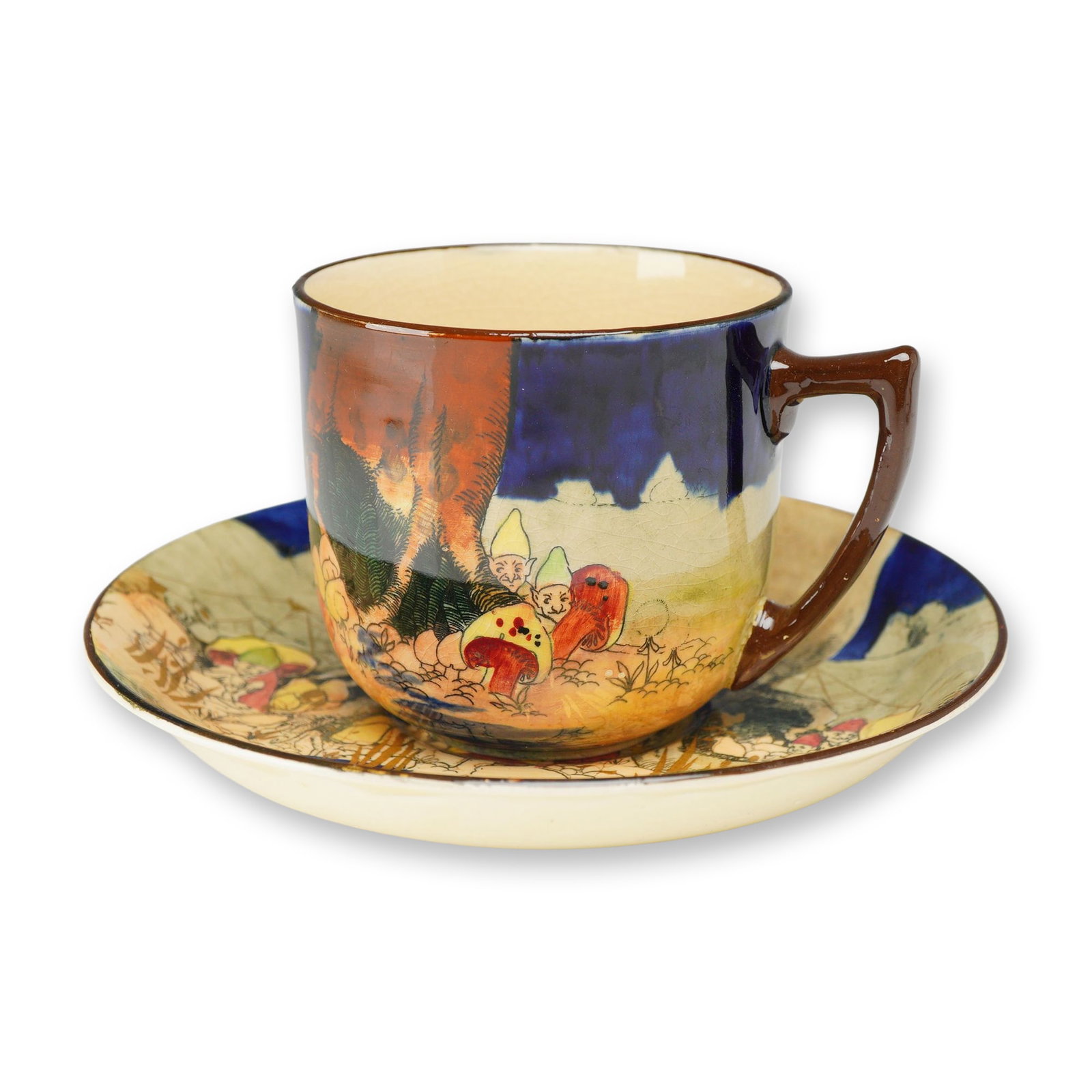 Royal Doulton Porcelain Seriesware Cup and Saucer, Gnomes D4697: Royal Doulton cup and saucer set featuring the delightful Gnomes pattern, showcasing a fanciful woodland scene with mischievous gnomes gathered beneath a tree surrounded by mushrooms. The coordinating