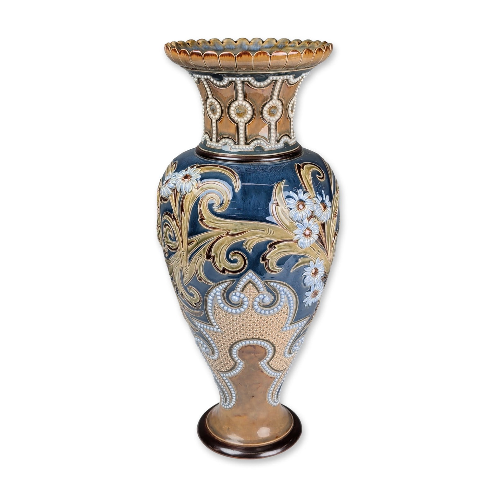 Doulton Lambeth by Eliza Simmance Stoneware Daisy Relief Vase: Doulton Lambeth salt-glazed stoneware vase featuring a tall ovoid form with a daisy floral scalloped rim and circular pedestal foot. The body is decorated with high-relief acanthus leaves in olive and