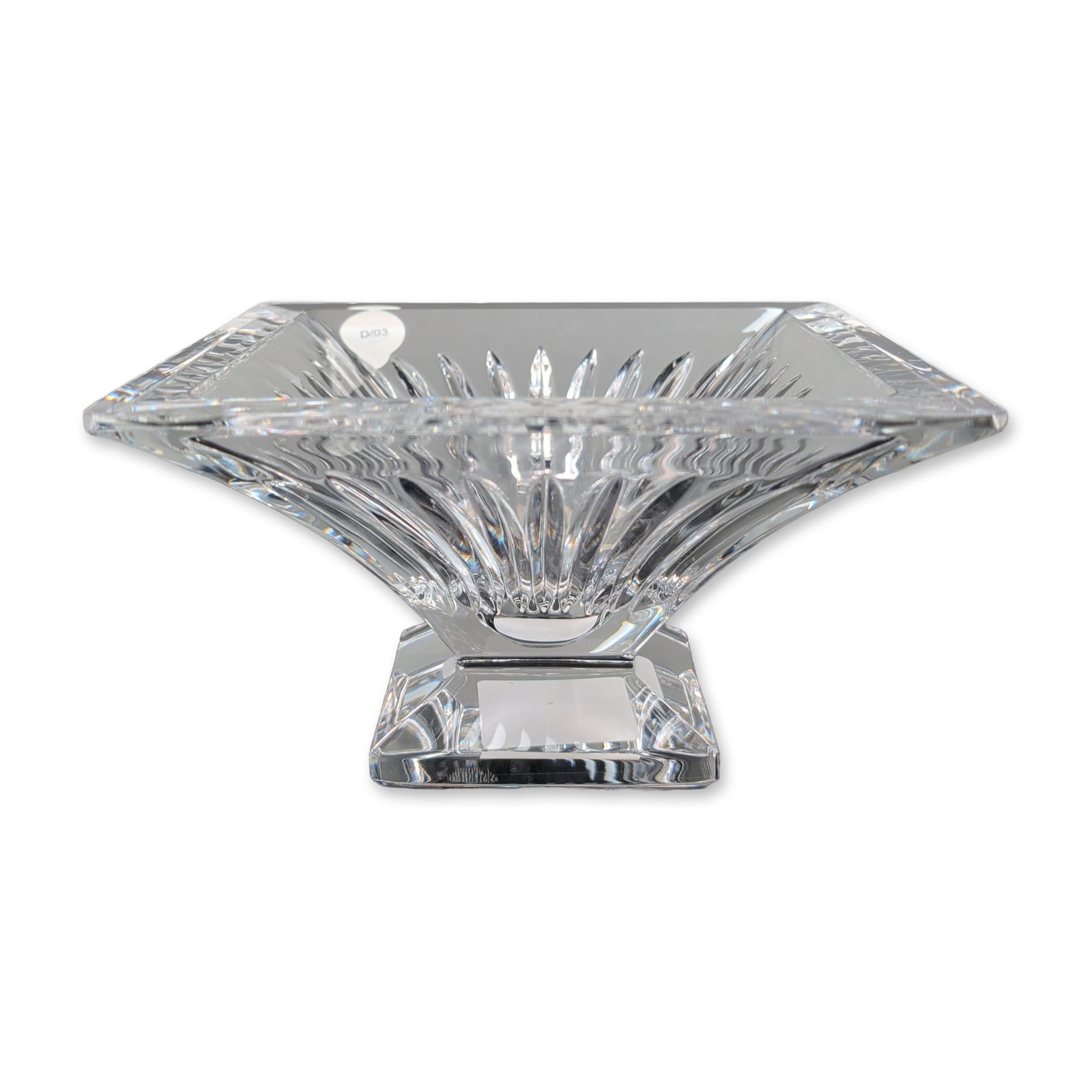 Waterford Clarion Lead Crystal Pedestal Bowl: Waterford lead crystal square pedestal bowl in the Clarion pattern. Design features deep radial wedge cuts extending from the center toward the corners. The vessel is elevated on a stepped square base