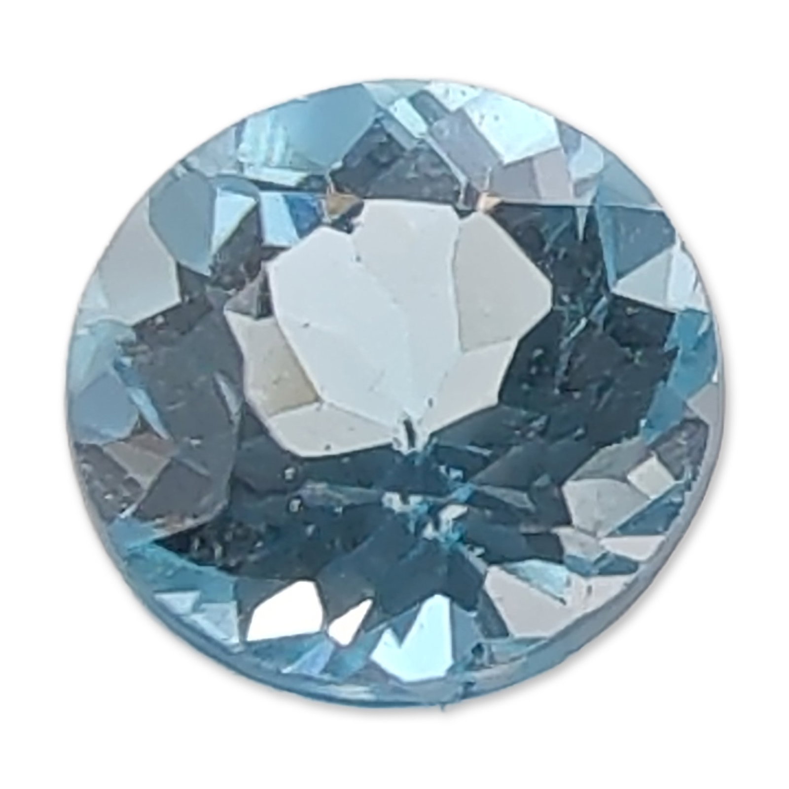 Round Faceted Light Blue Topaz Gemstone: Loose round faceted Topaz gemstone featuring a uniform light sky-blue hue and brilliant-style cutting. Gemstone exhibits high clarity with no surface-reaching inclusions visible to the naked eye. Appr