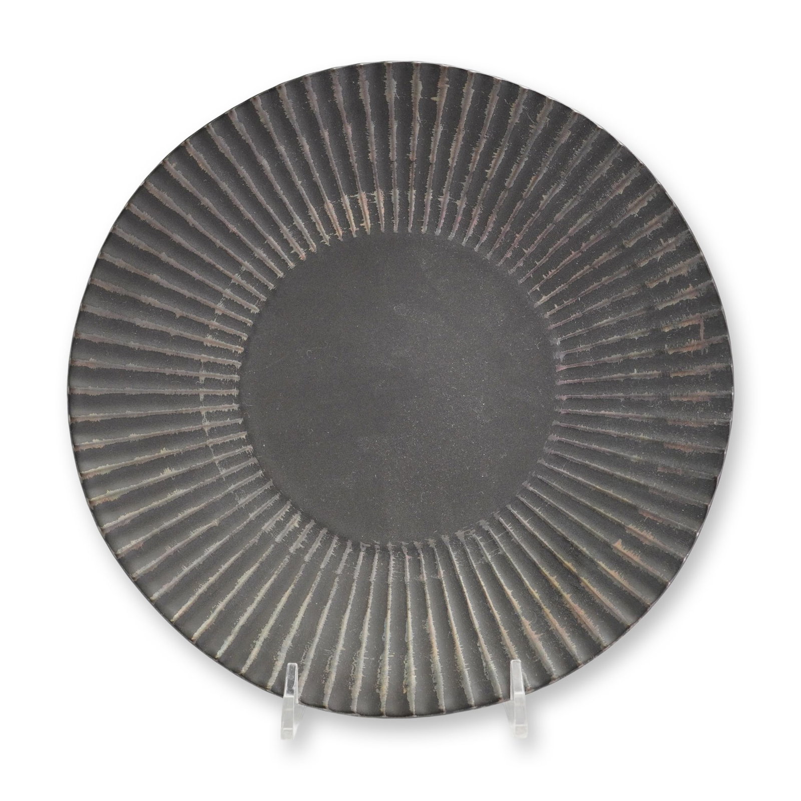 Tokyo Design Studio Black Basalt Ceramic Plate: Tokyo Design Studio contemporary ceramic rimmed plate featuring a matte black basalt glaze finish. The wide, flaring rim is decorated with radial grooves in the Japanese shinogi style, with the glaze 