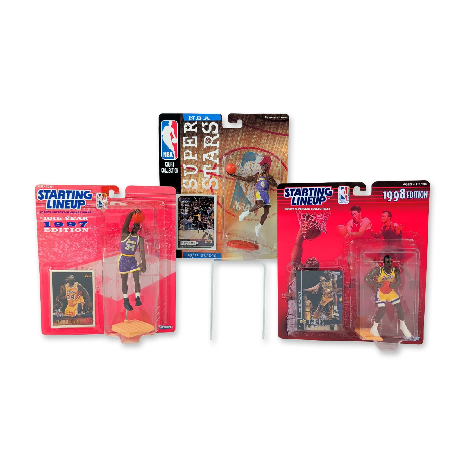 3pc Los Angeles Lakers Kenner Starting Lineup and Super Stars NBA Action Figure Collection: This collection of vintage sports action figures features prominent members of the Los Angeles Lakers basketball franchise in original factory retail packaging. The pieces include individual Kenner