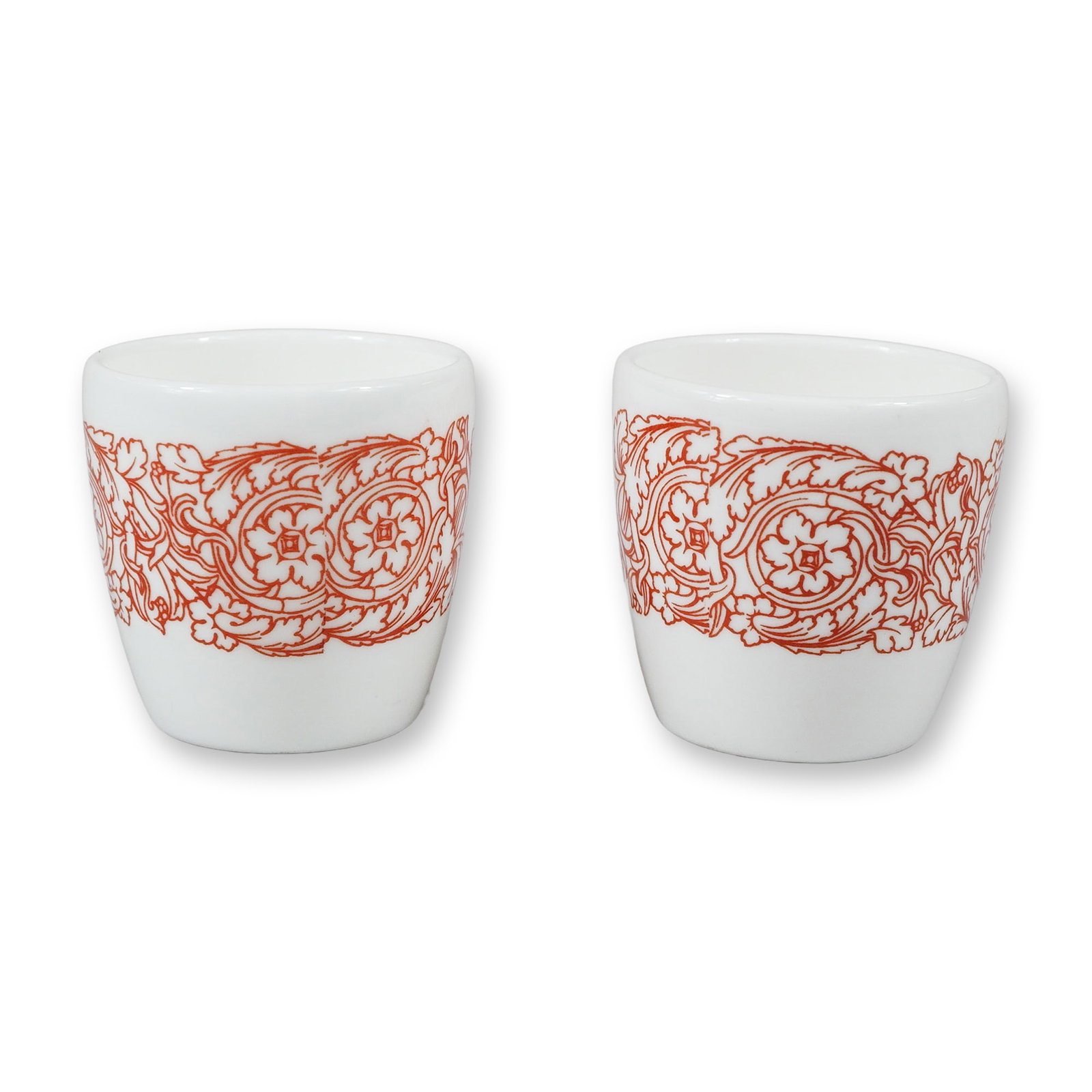 Two Small Wedgwood Bone China Hotelware Teacups: This pair of small teacups was manufactured by Wedgwood in England as part of their bone china hotelware line. Each piece features a handleless, slightly tapered cylindrical form with a rounded base. 