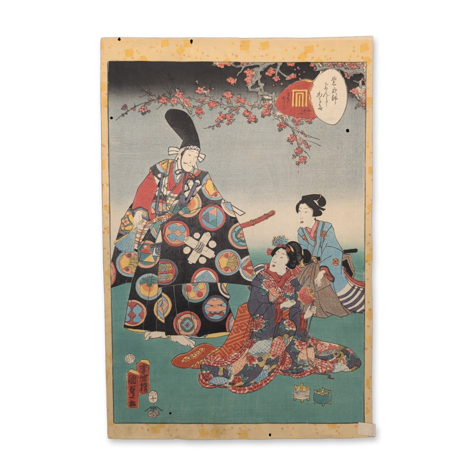 Utagawa Kunisada II (Japan 1823-1880) Woodcut on Paper from The Tale of Genji: An Edo-period Japanese nishiki-e multi-color woodblock print of a Genji-e scene that depicts a central male figure in an eboshi court cap and a black kimono decorated with varied roundel crests. He is