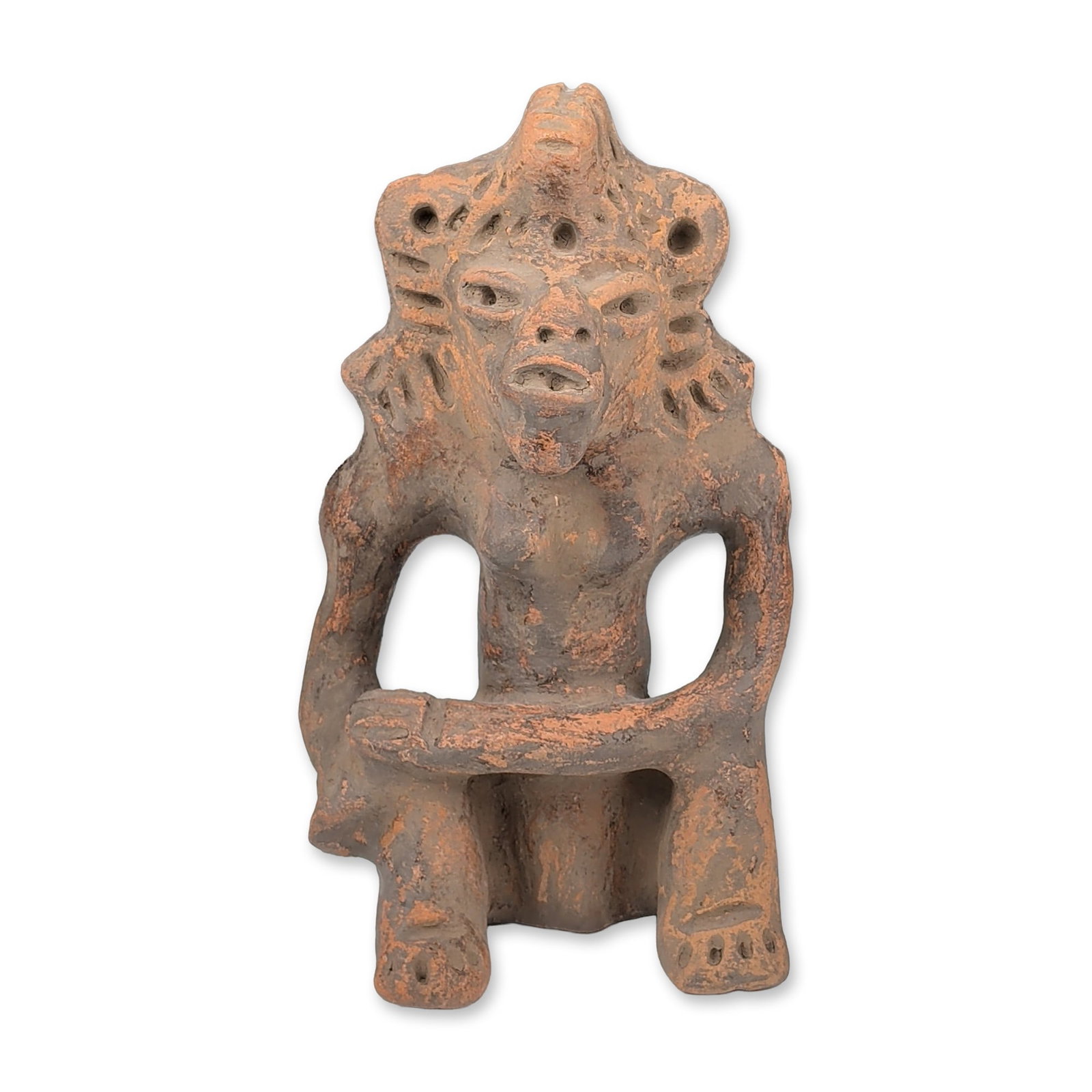 Pre-Columbian Ceramic Seated Figurine: Seated female figure depicted in a crouching posture with arms resting on knees. The head features an elaborate headdress adorned with numerous circular punctate holes and deep vertical and
