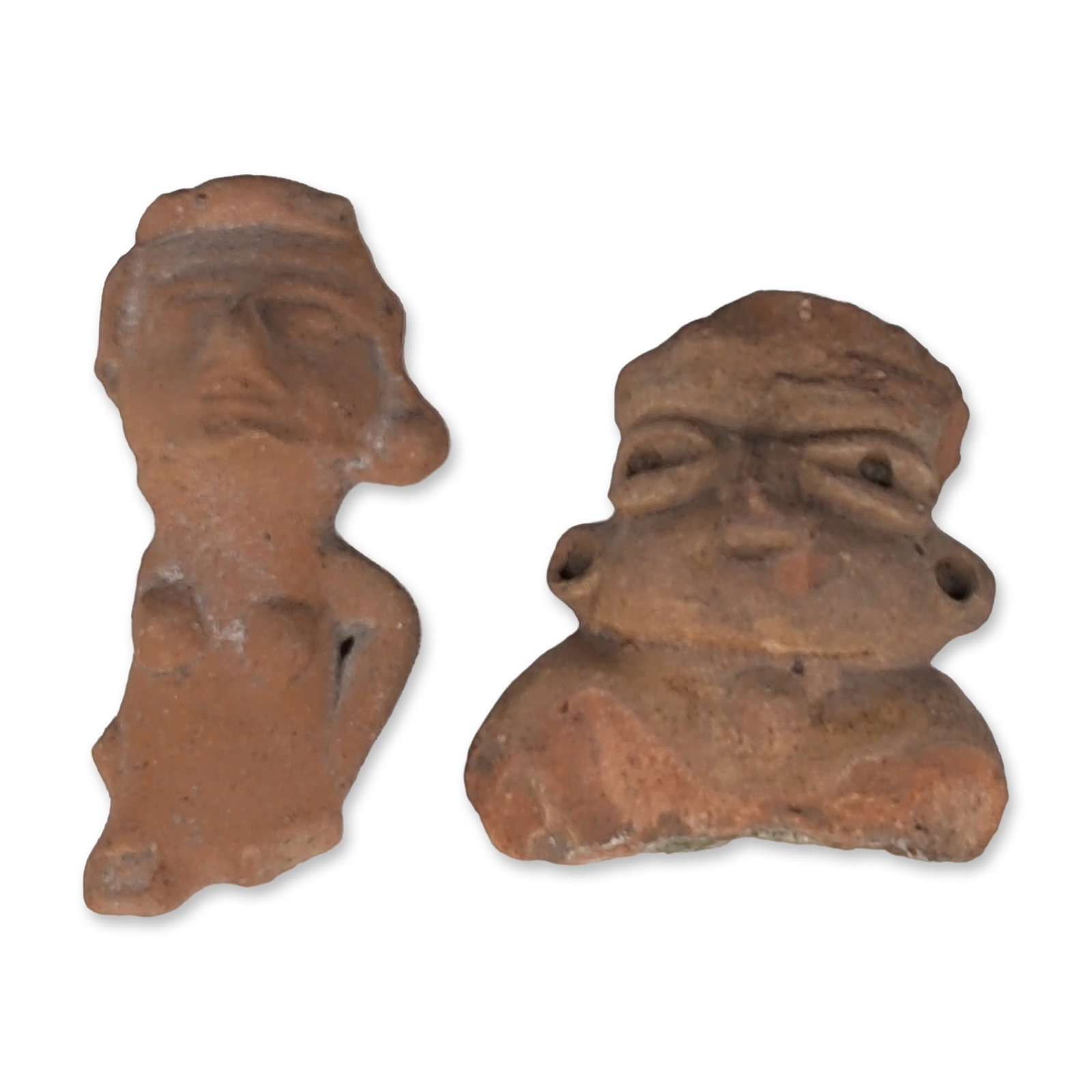 2pc Pre-Columbian Terracotta Statue Fragments: The reddish-orange ceramic pieces include a stylized female torso featuring a horizontally banded headband, almond-shaped slit eyes, and small rounded breasts. The second fragment consists of a head
