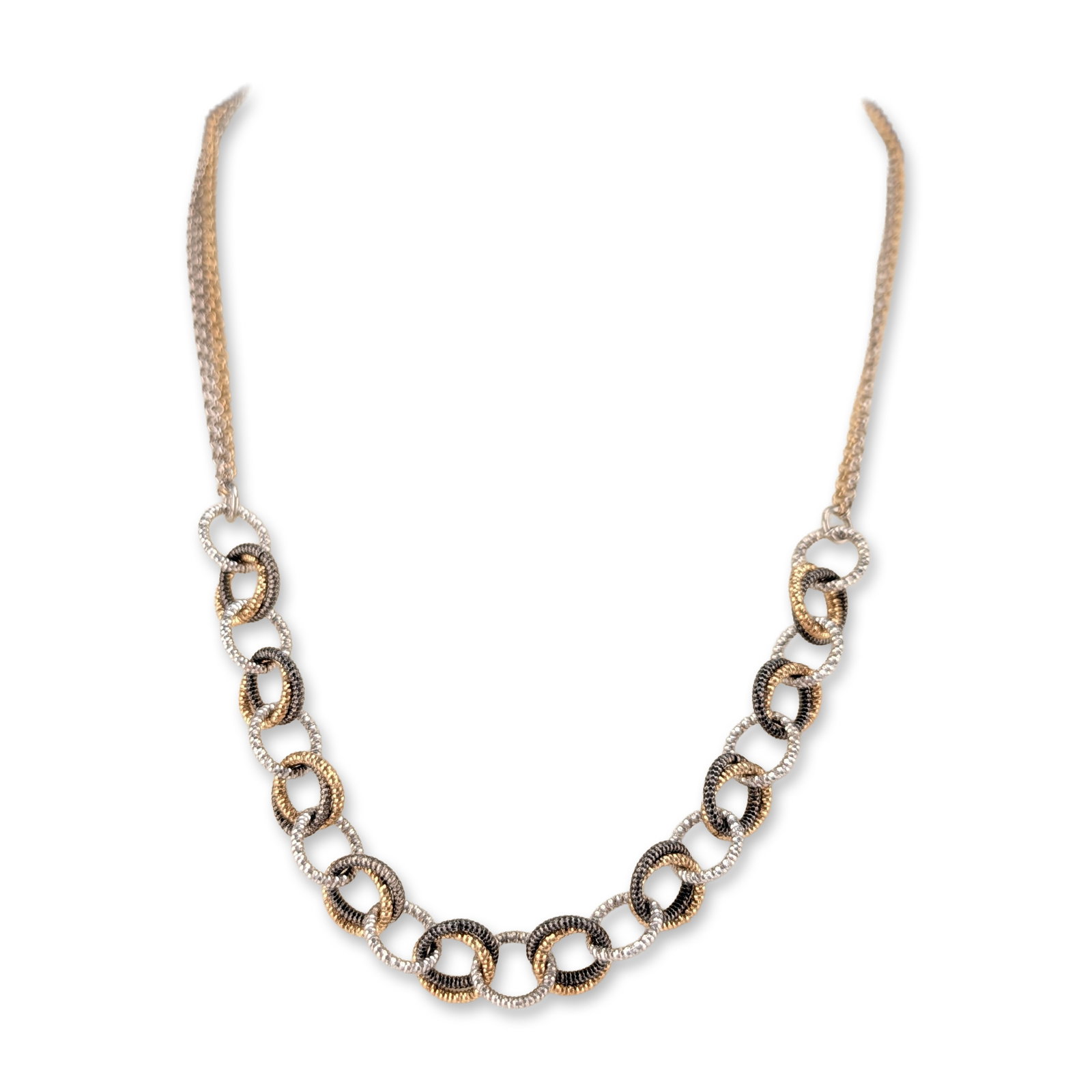 Frederic Duclos Tri-Color Sterling Silver Link Necklace: Frederic Duclos tri-color metal necklace featuring a decorative center section of interlocking circular links with a textured beaded finish in silver, yellow gold, and dark grey tones. The main body o
