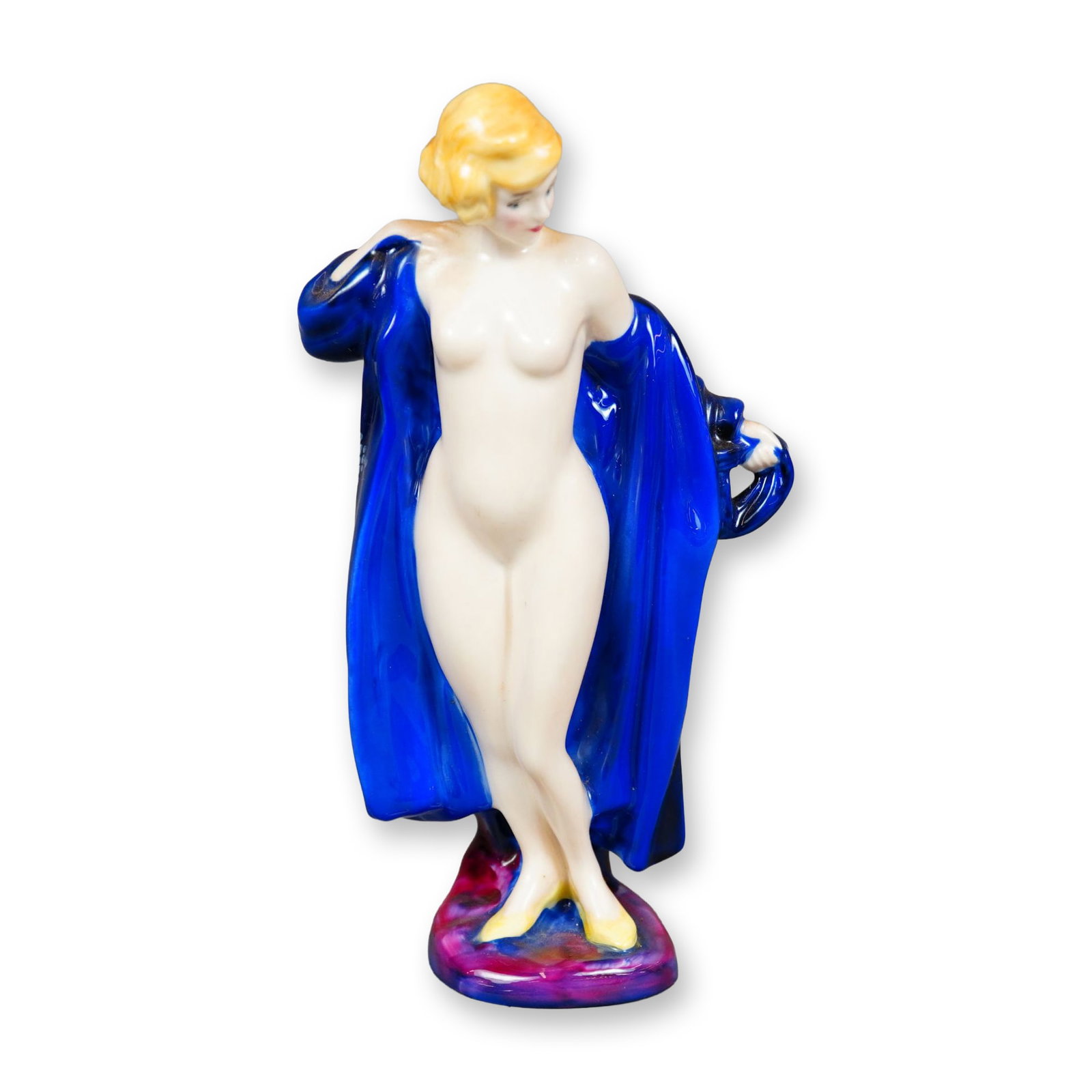 Royal Doulton Bone China Archives Figurine, The Bather HN4244: Inspired by Leslie Harradine original model, this limited edition bone chine figure depicts a nude woman in a blue bath robe. Royal Doulton backstamp. Dimensions: 4.25"L x 3"W x 7.25"H Date or Era: 20