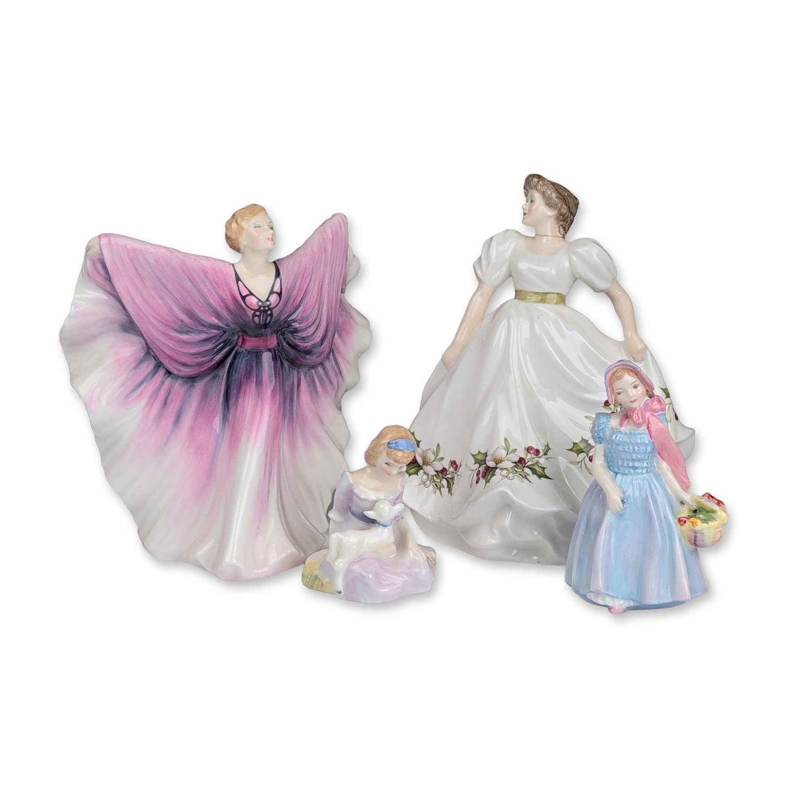 4pc Royal Doulton Porcelain Figurines, Isadora, Teresa, Mary Had a Little Lamb, and Wendy: An assortment of four Royal Doulton glazed porcelain figurines: Isadora (HN 2938, 1986) in a violet and magenta gown, designed by Peter A. Gee; Teresa (HN 3206, 1993) with hand-painted holly, designed