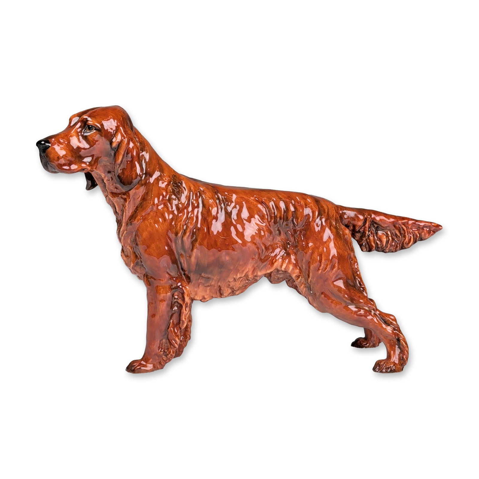 Royal Doulton Large Championship Figurine, Irish Setter HN1054: Designed by Fredrick Daws. The figurine depicts the dog in a standing pose with a characteristic mahogany-red coat and feathered tail, finished in a high-gloss glaze. Marks include a green Royal Doult