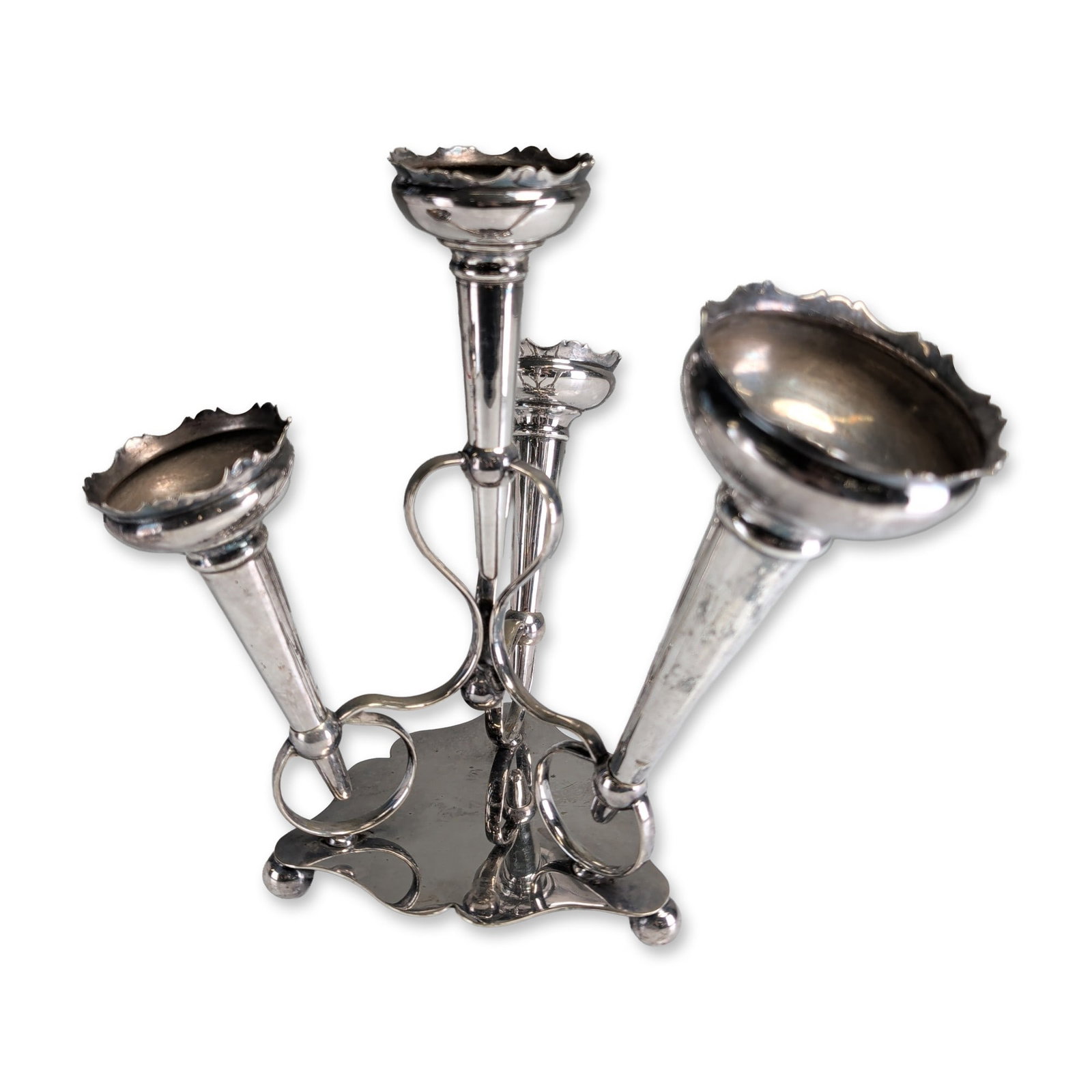 James Deakin and Sons Victorian Silver-Plated Epergne: Late Victorian silver-plated epergne by James Deakin and Sons, Sheffield. The center flower stand features a scrolling wire-form frame mounted on a scalloped shield-shaped base supported by three larg