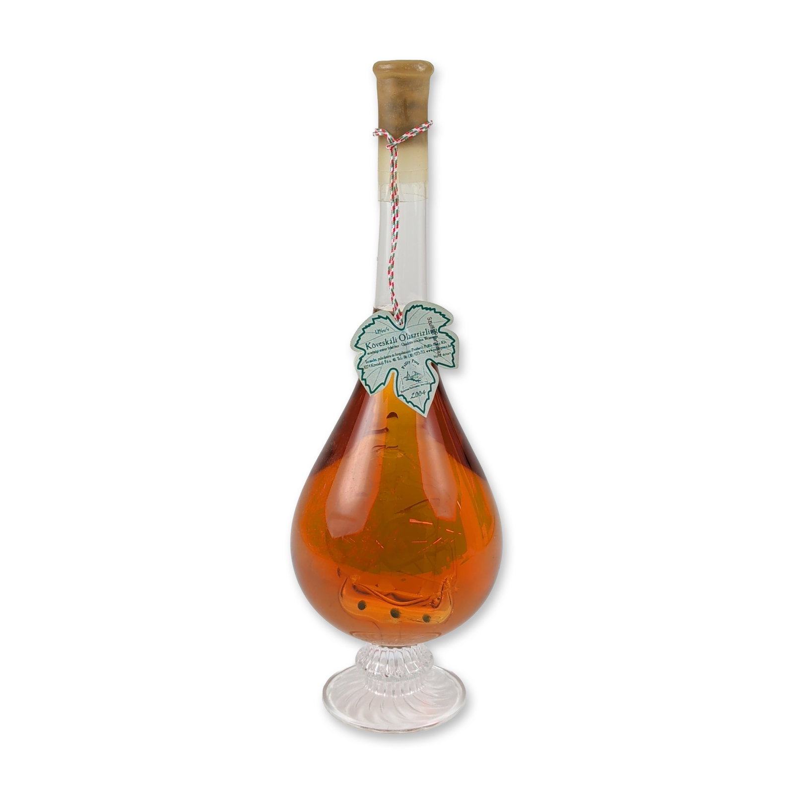 Palffy Pince Koveskali Olaszrizling 2004 "Ship-in-a-Bottle" Edition: This 2004 vintage specialty wine from the Balaton-felvidek region of Hungary is produced from the Olaszrizling grape variety by Palffy Pince. The clear glass teardrop bottle features an integrated, ha