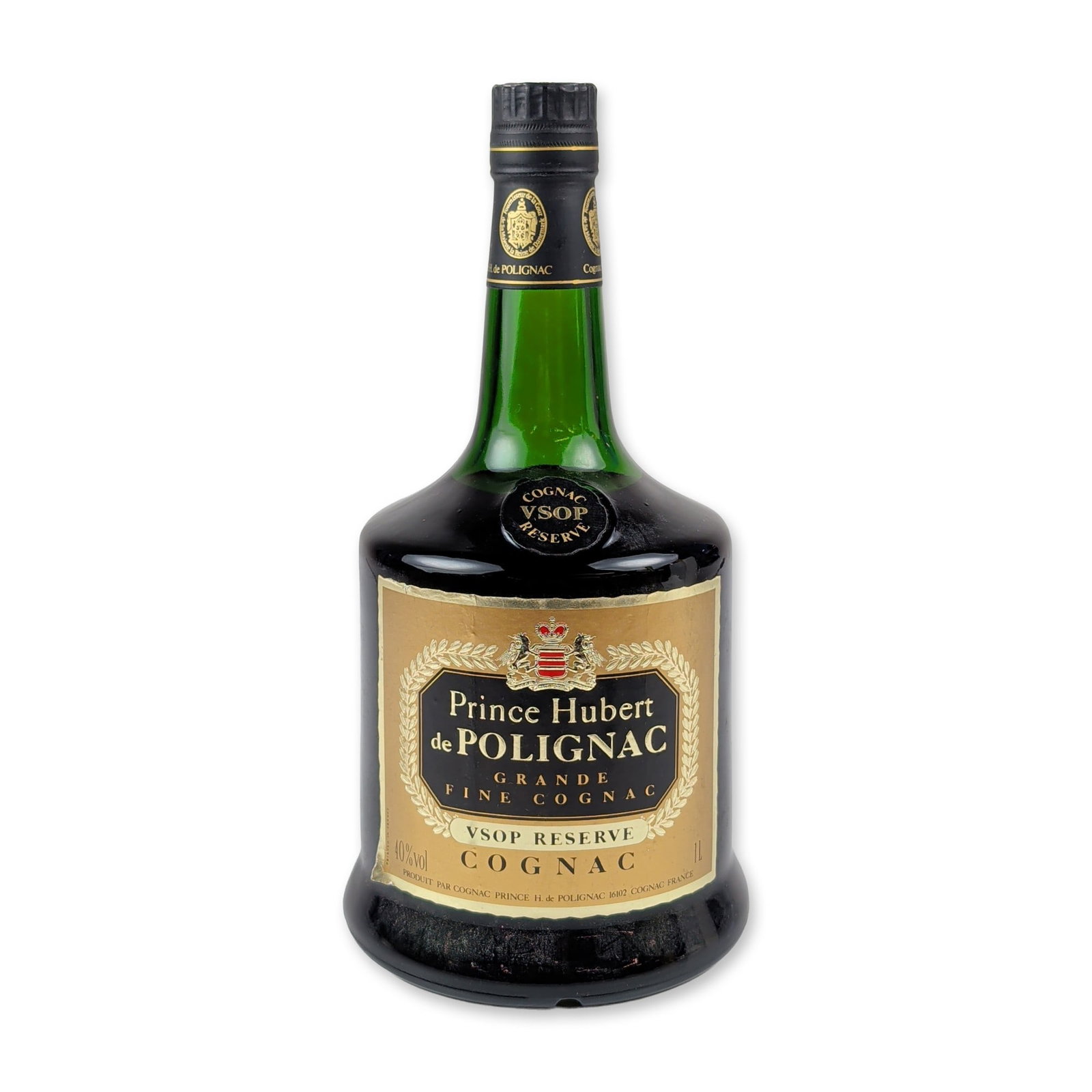 Prince Hubert de Polignac VSOP Reserve Grande Fine Cognac: This vintage late-20th-century 1-liter French regional import is bottled at 40% alcohol by volume and contains premium VSOP Reserve Grande Fine Cognac produced by Prince Hubert de Polignac. The green 